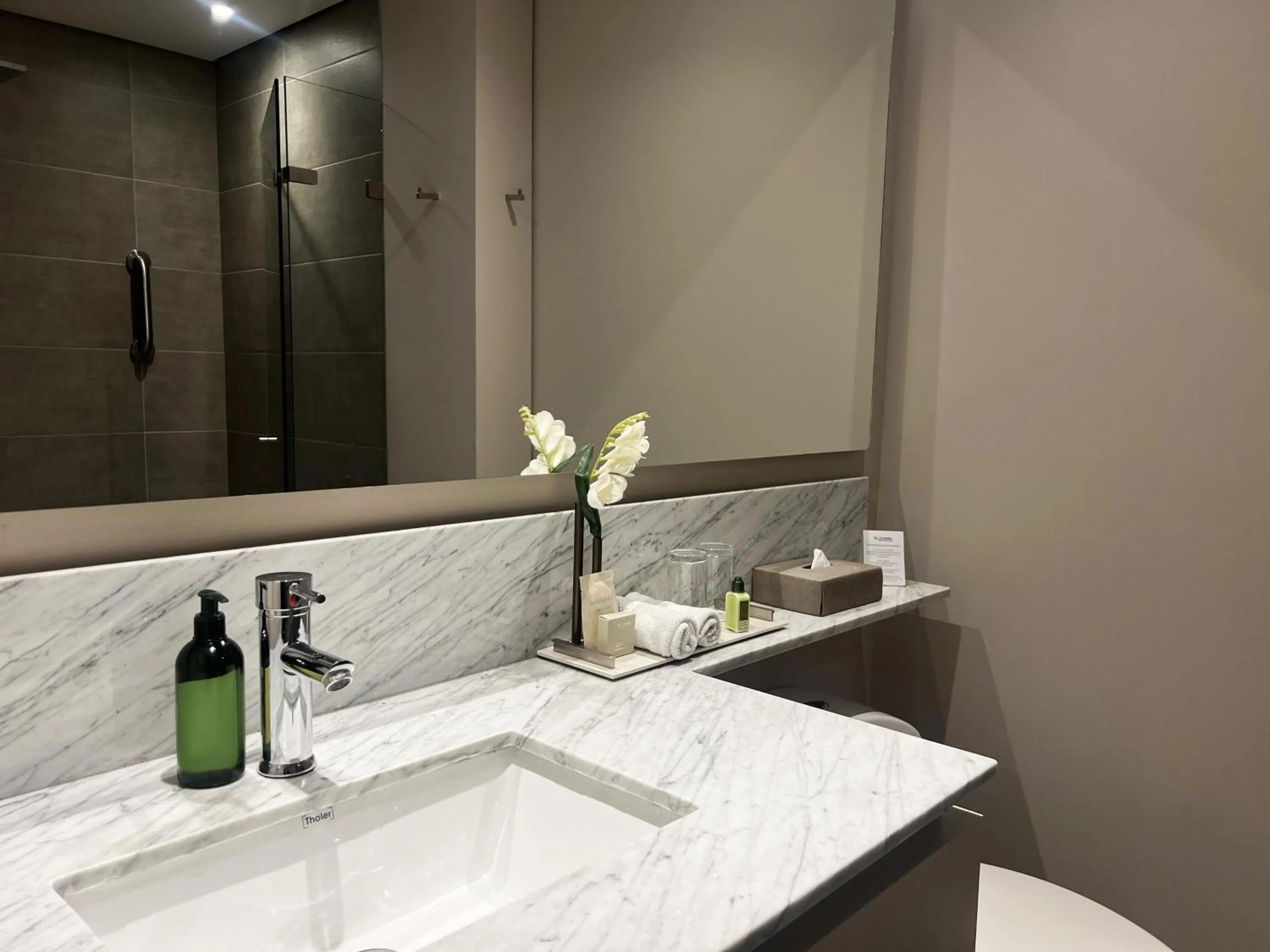 Bathroom in York Medellin, Curio Collection by Hilton