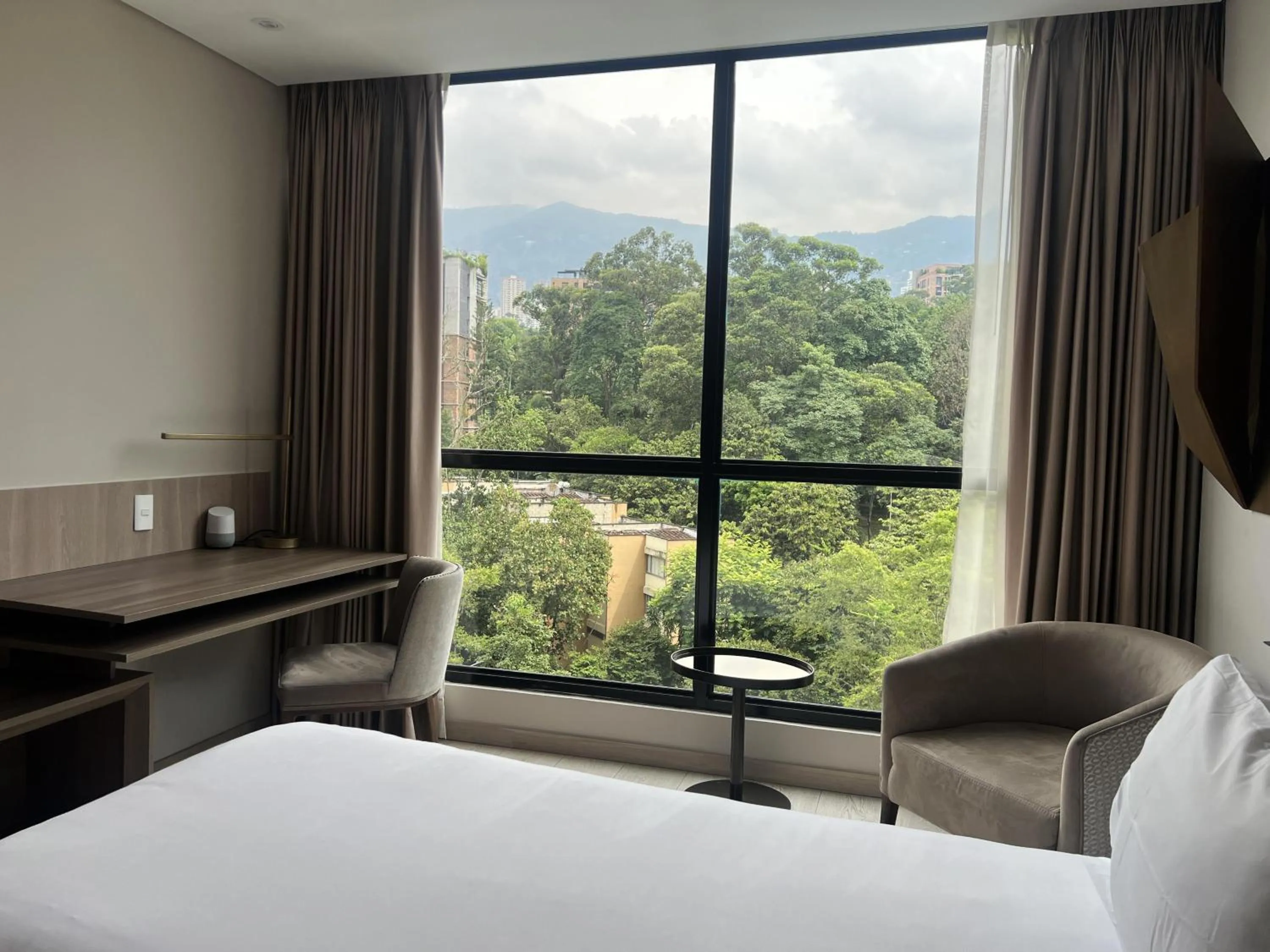 Bed in York Medellin, Curio Collection by Hilton