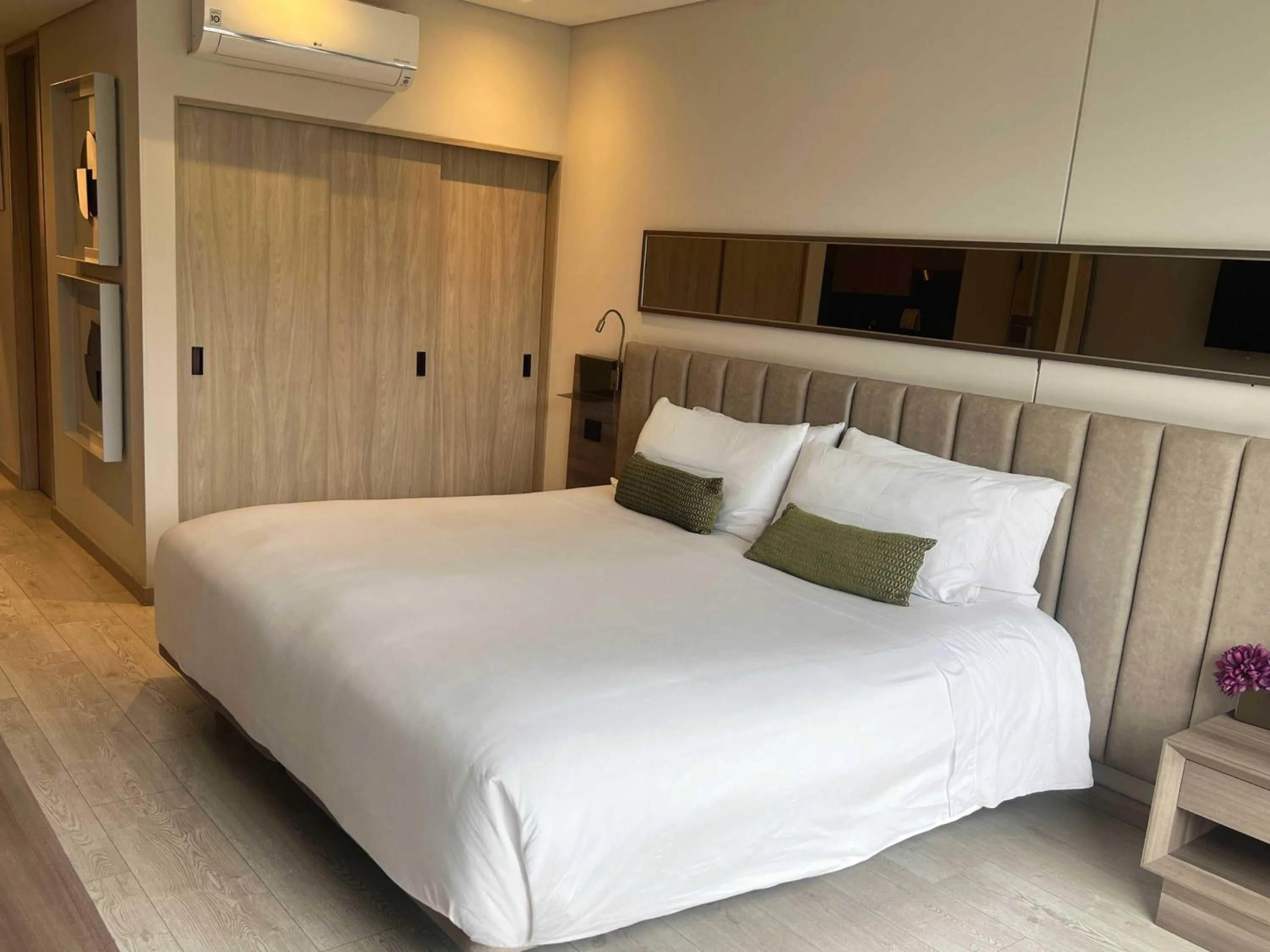 Bed in York Medellin, Curio Collection by Hilton