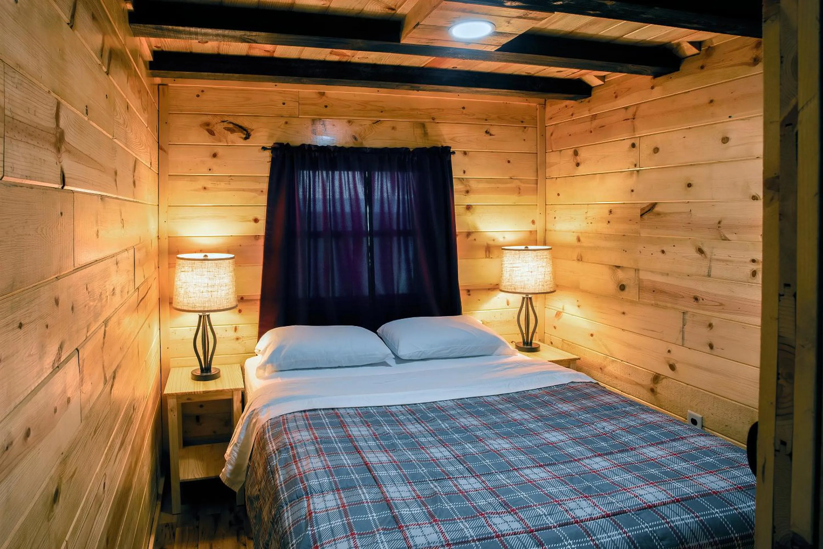 Bedroom, Bed in Big River Escape Riverside Cabins