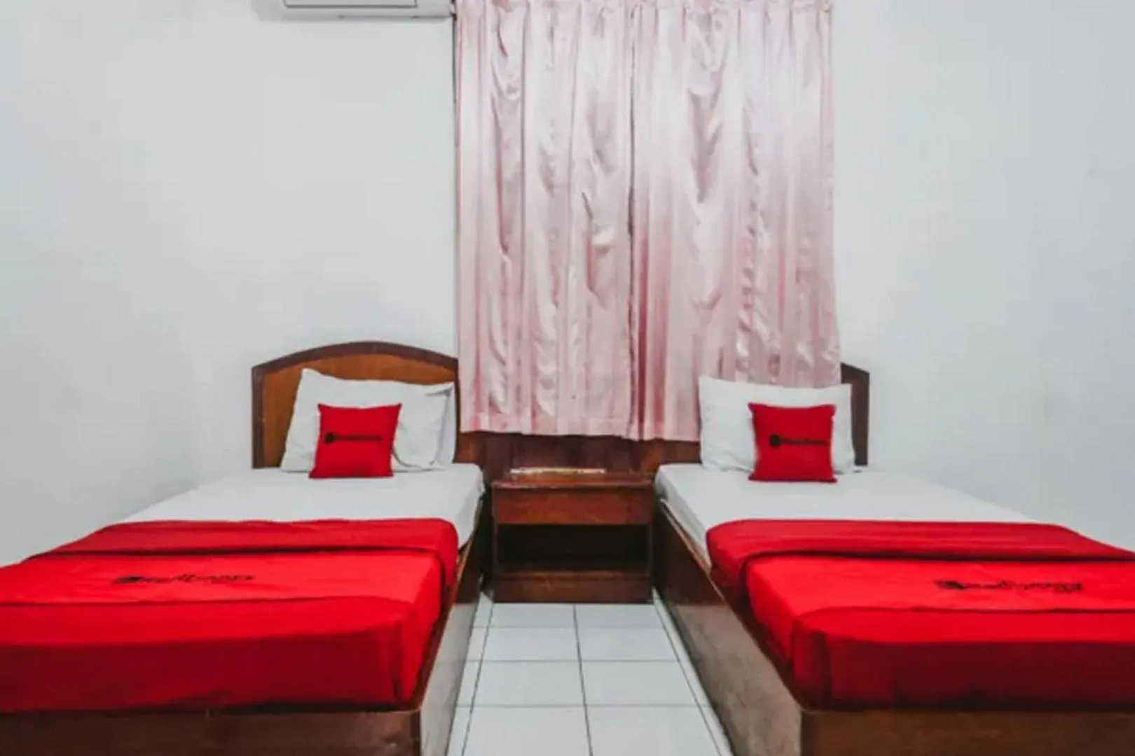 Bedroom, Bed in RedDoorz Plus at Neo Asri Hotel Megamendung Puncak Bogor