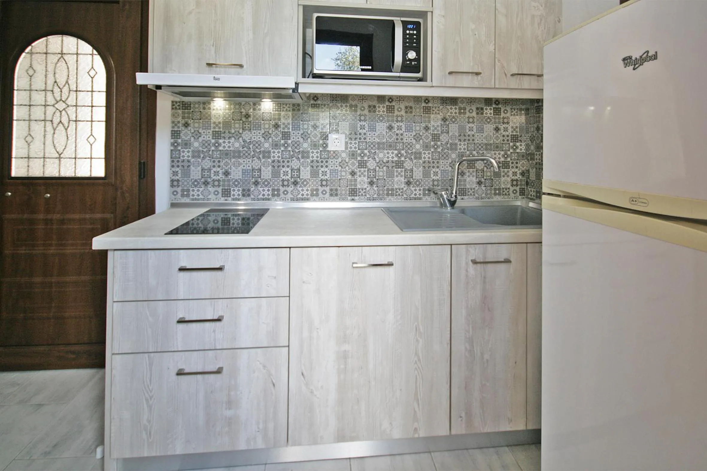 Kitchen or kitchenette in Villa Angela