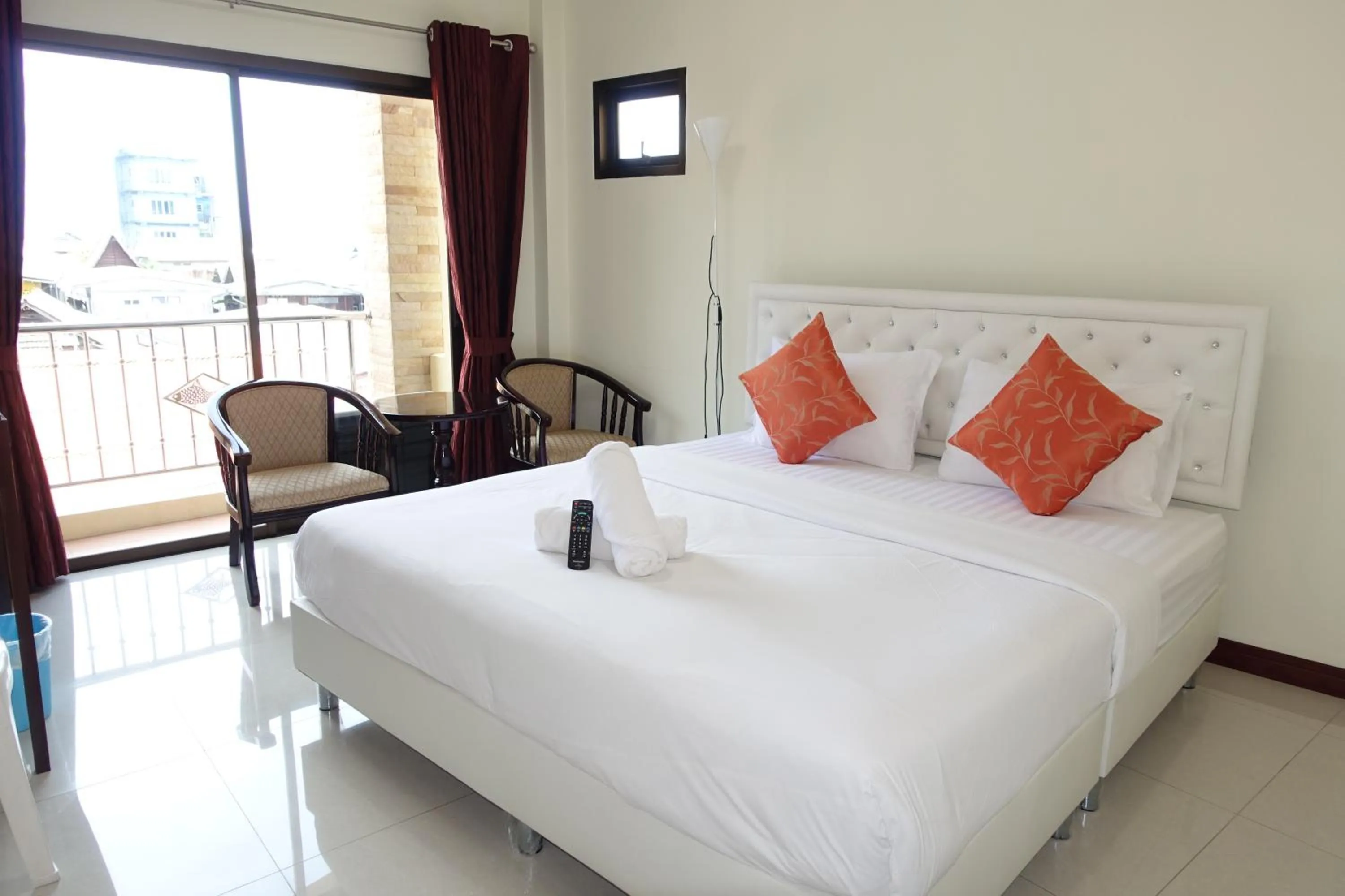 Bed in Baan Taweesuk Guest House