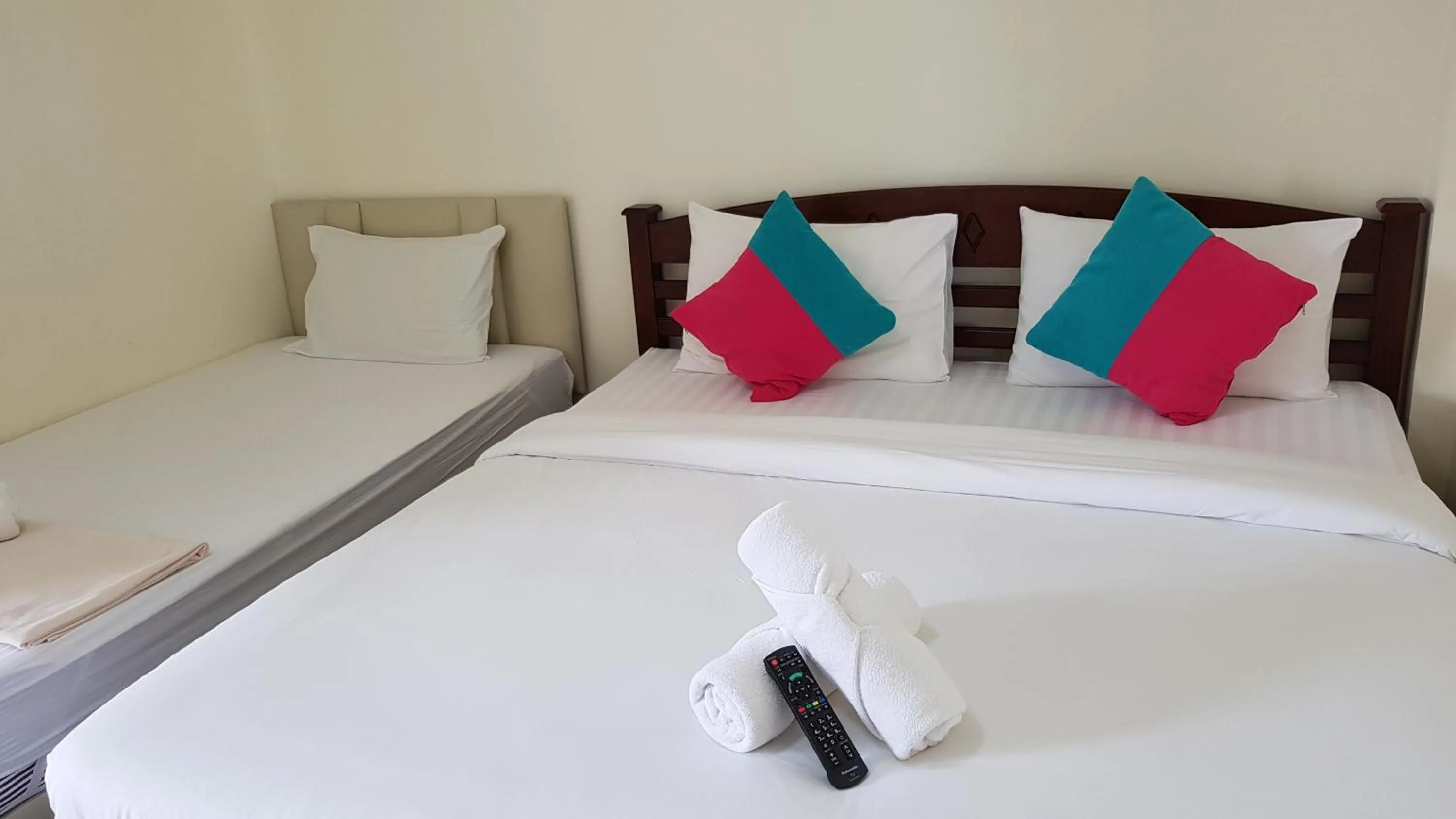 Bed in Baan Taweesuk Guest House