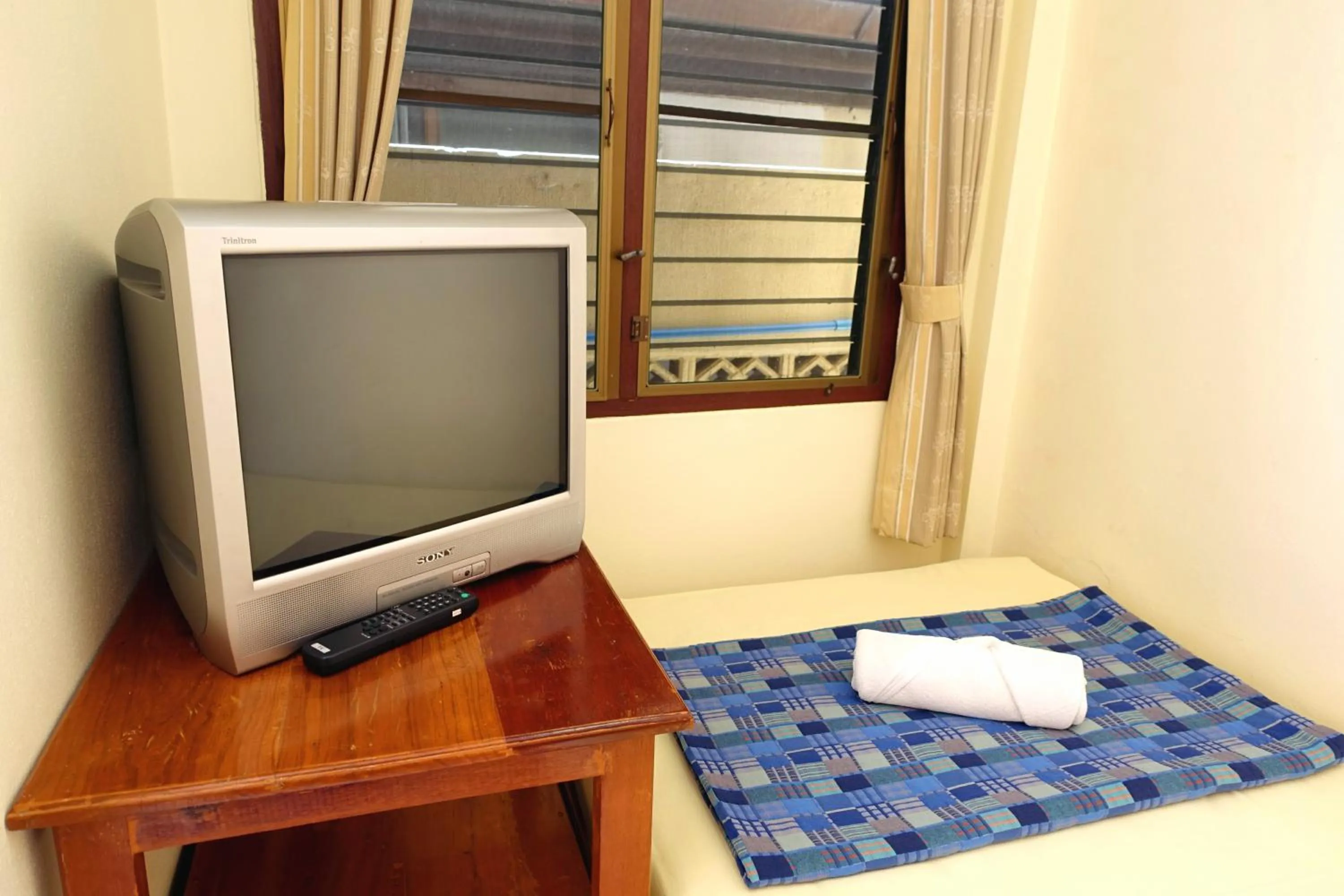 Bed in Baan Taweesuk Guest House