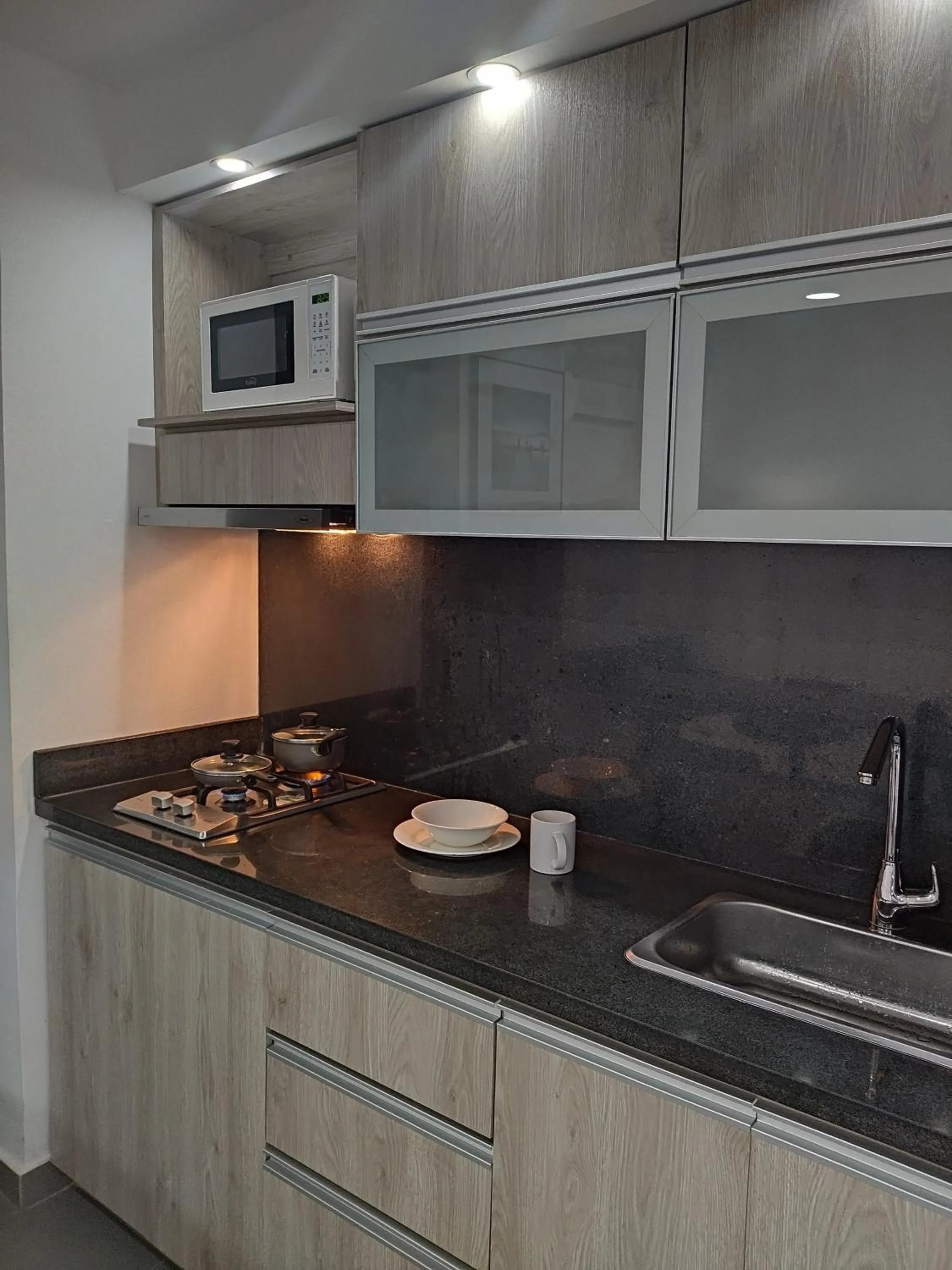 Kitchen or kitchenette in Berilo Deluxe Apartahotel