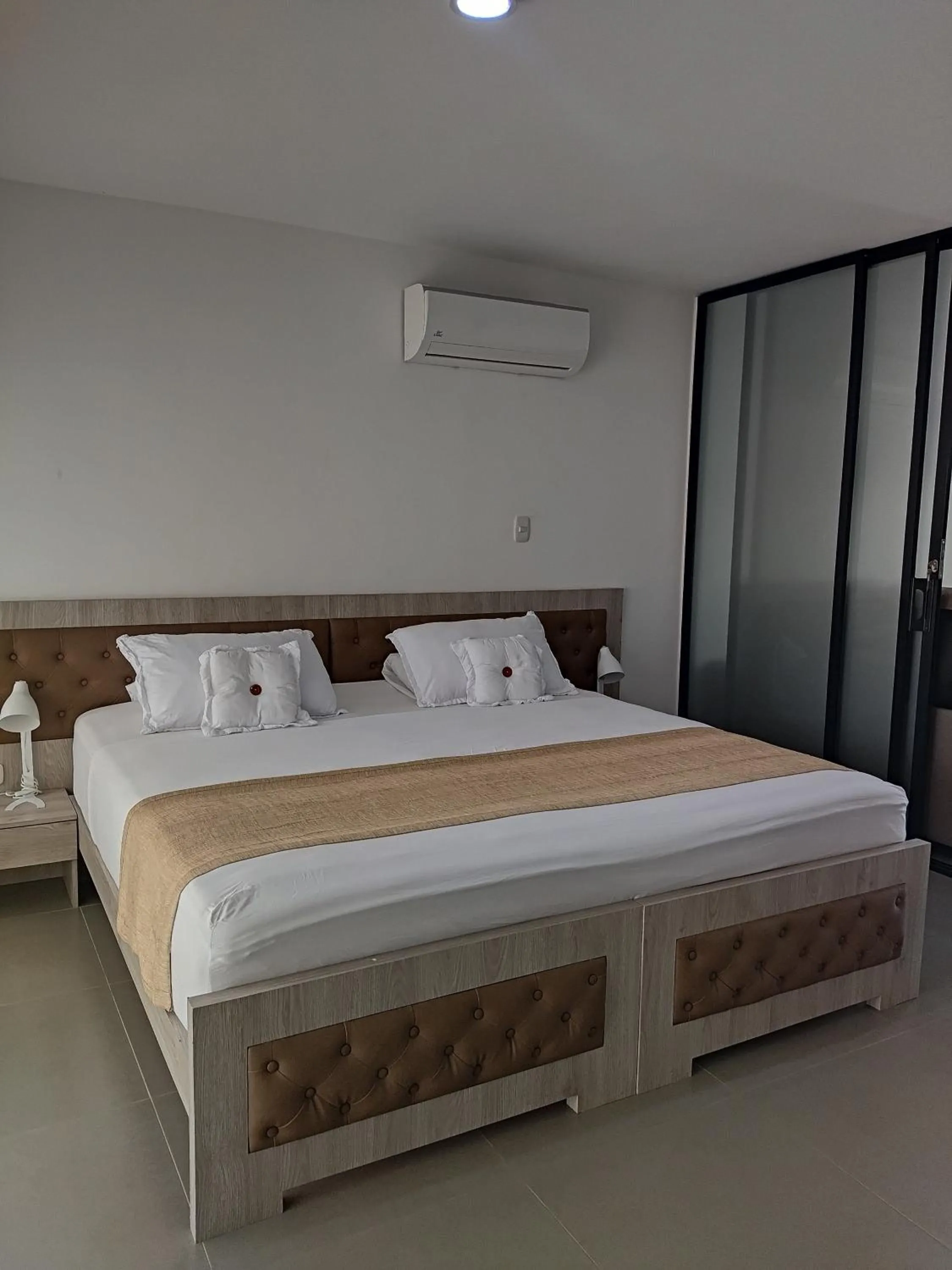 Bed in Berilo Deluxe Apartahotel