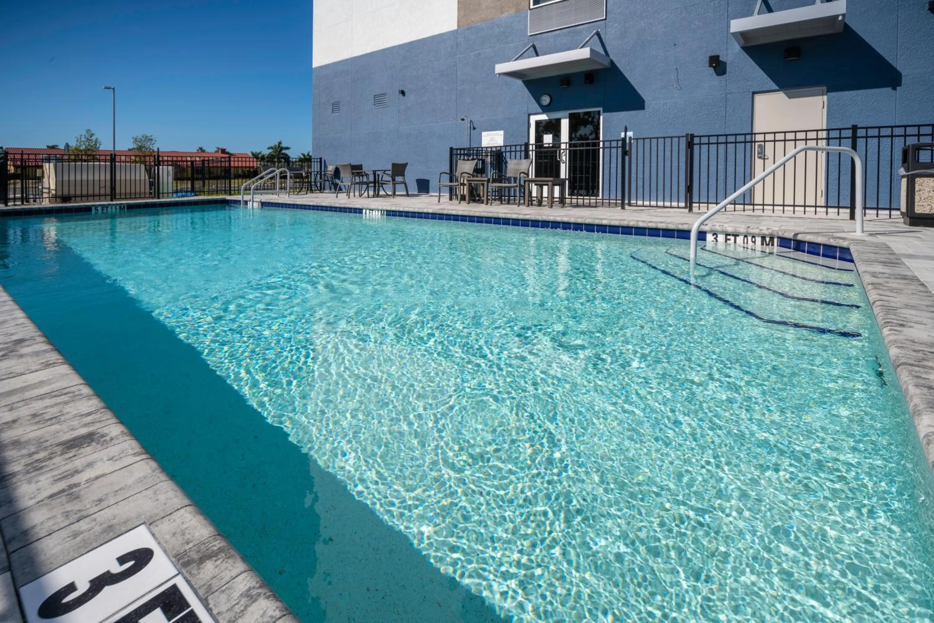 Swimming pool in Holiday Inn Express & Suites - Fort Myers Airport by IHG