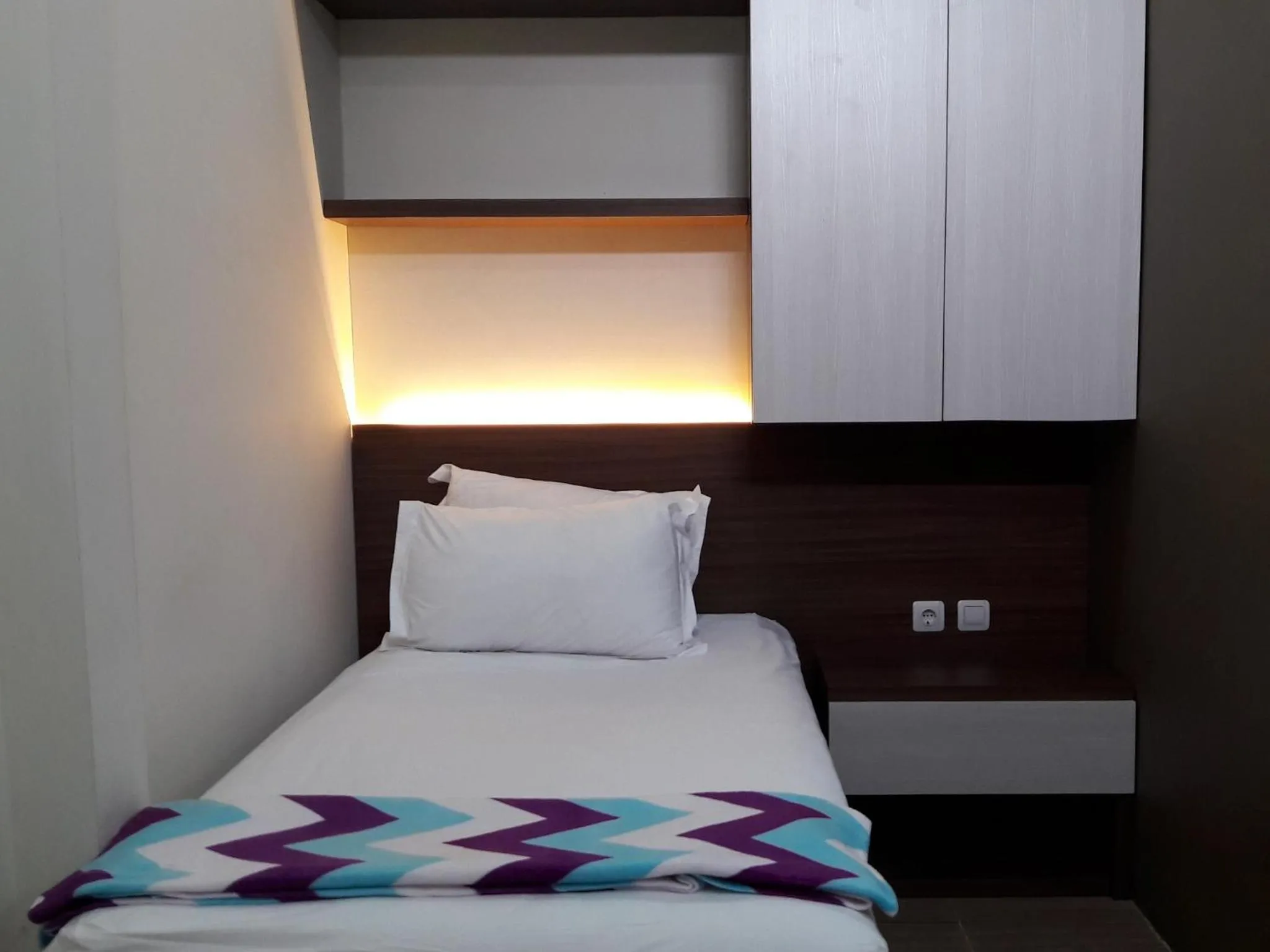 Bed in The Peak Guest House