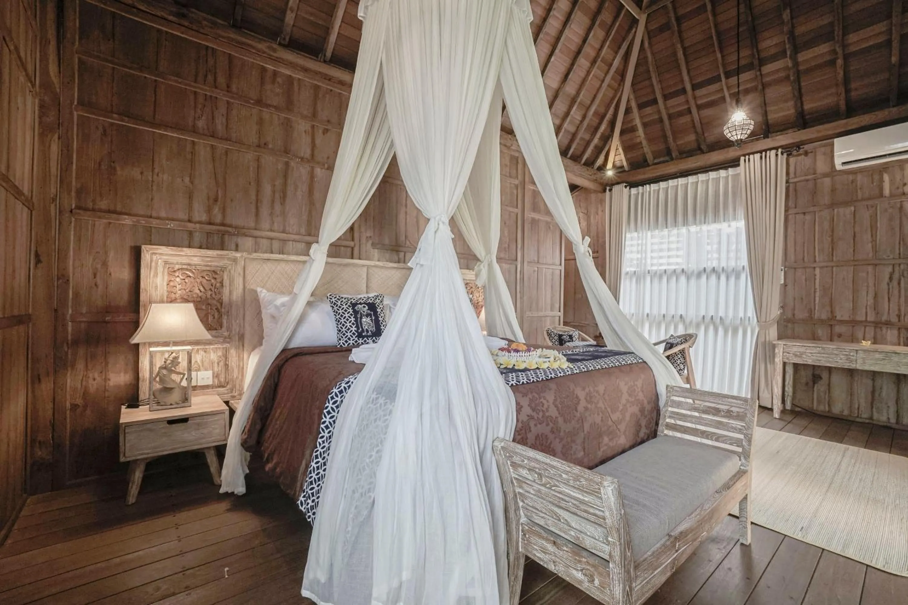 Bed in Kirani Joglo Villa Bali by Mahaputra