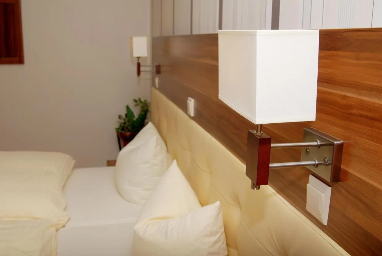 Bed in Hotel-Restaurant Laux