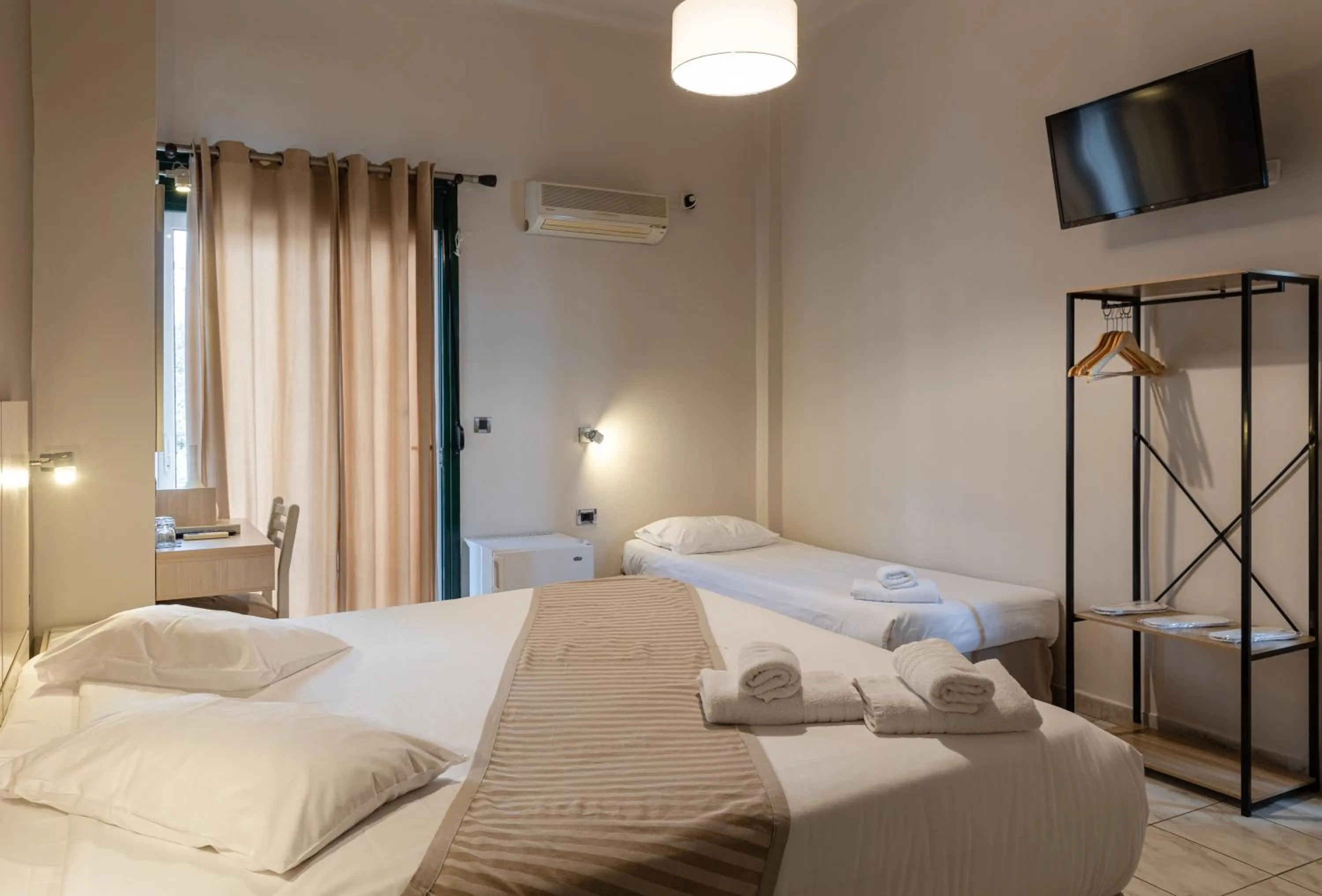 Photo of the whole room, Bed in Plaza Hotel