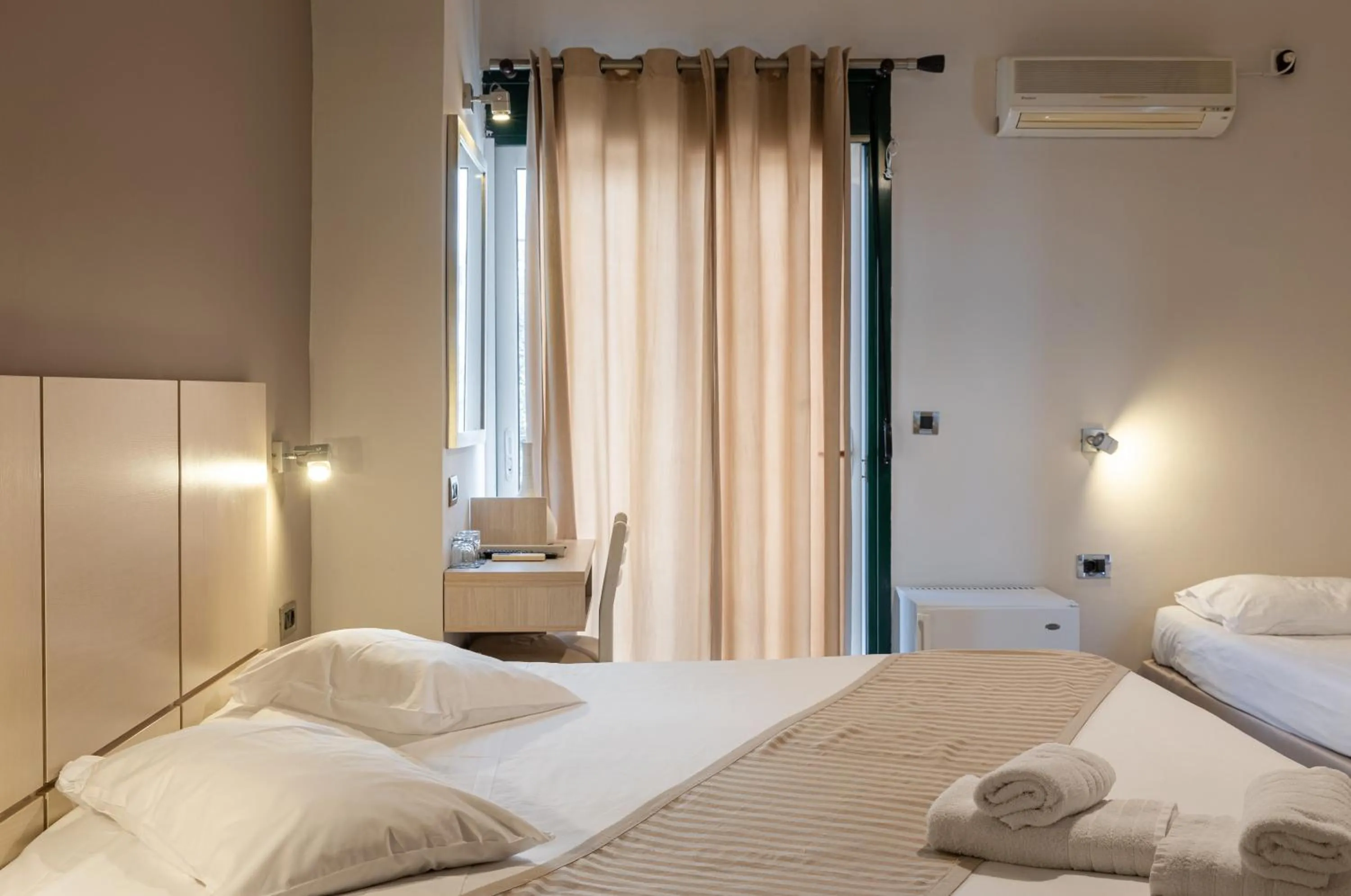 Photo of the whole room, Bed in Plaza Hotel