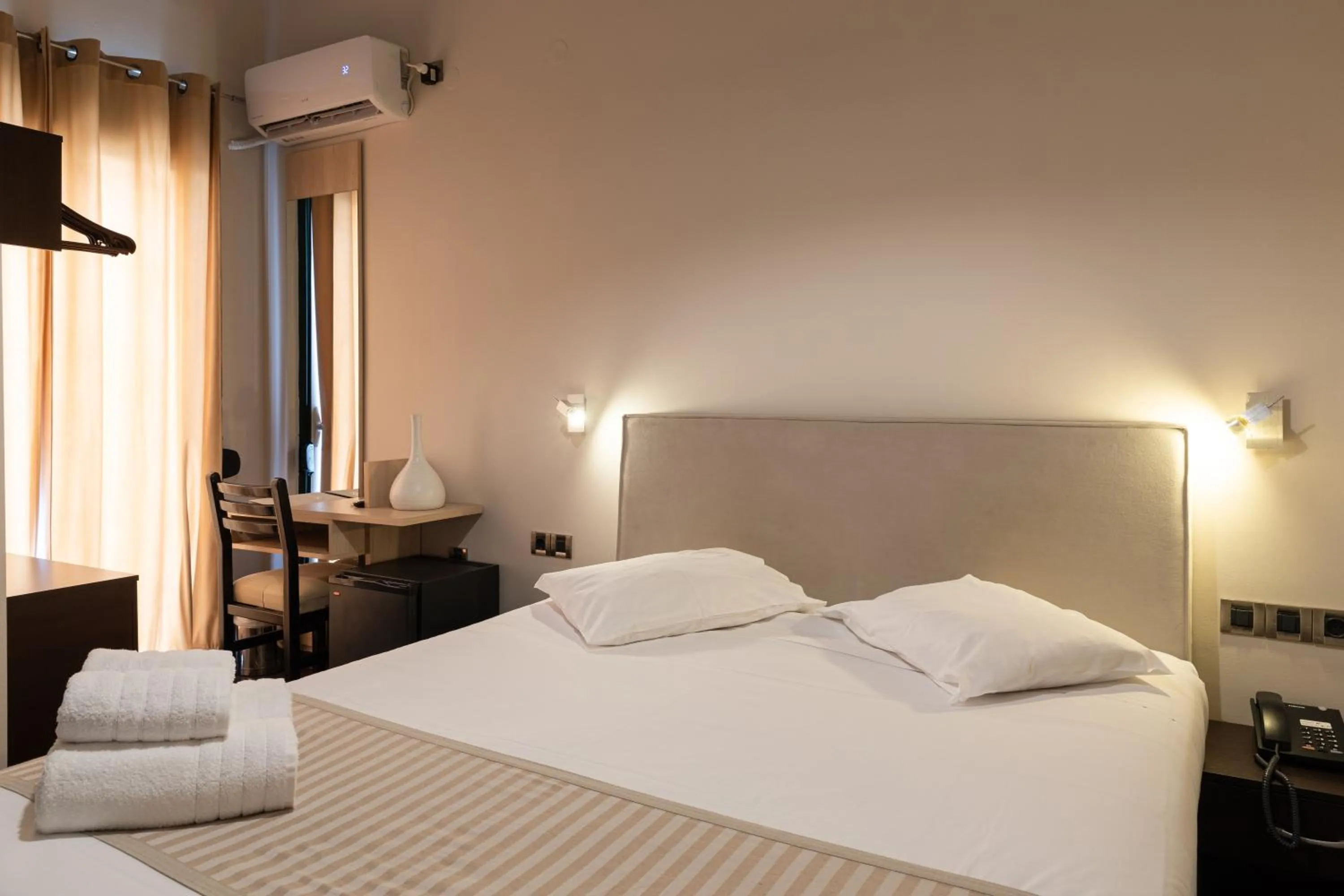 Photo of the whole room, Bed in Plaza Hotel