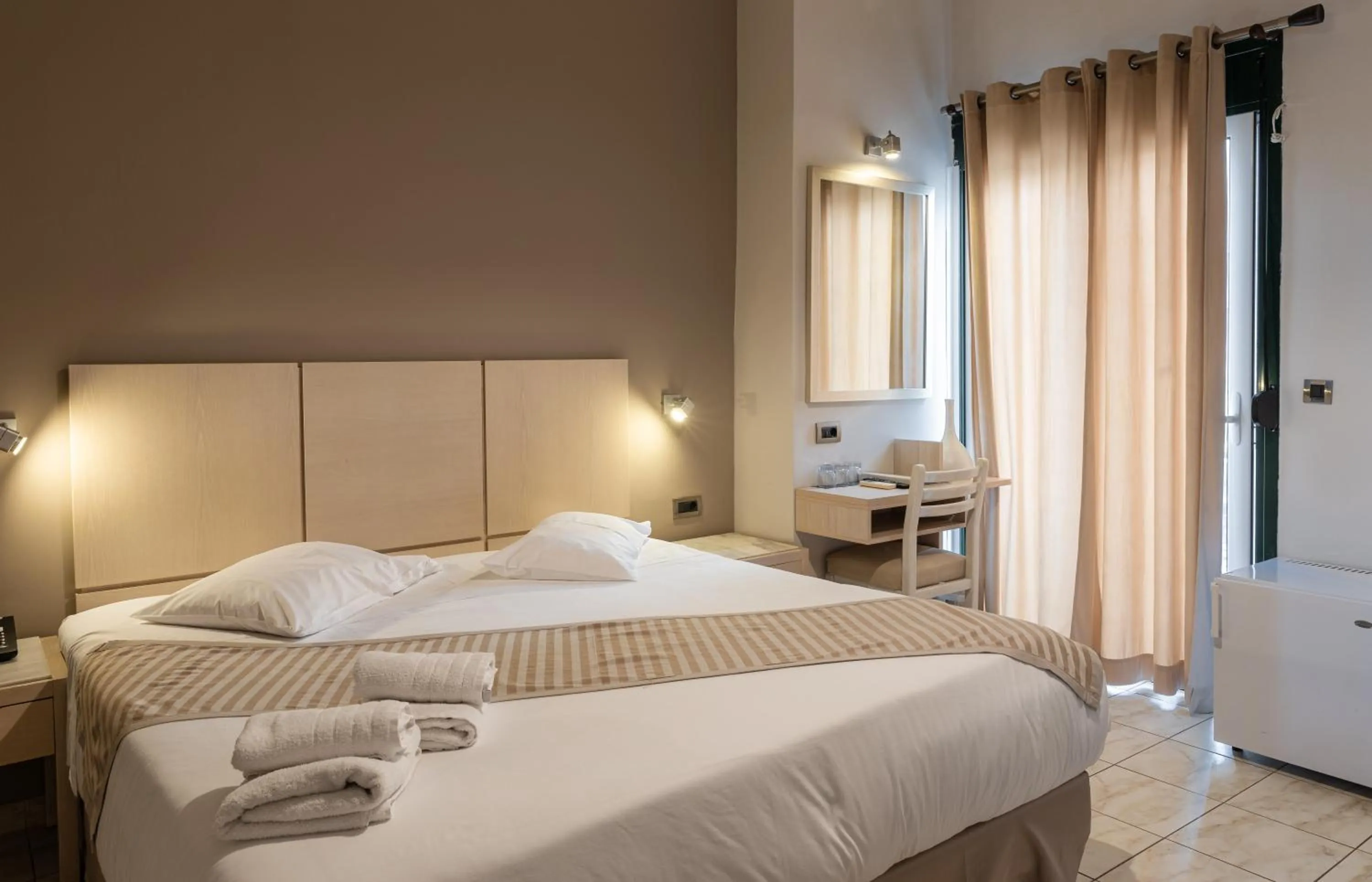 Photo of the whole room, Bed in Plaza Hotel