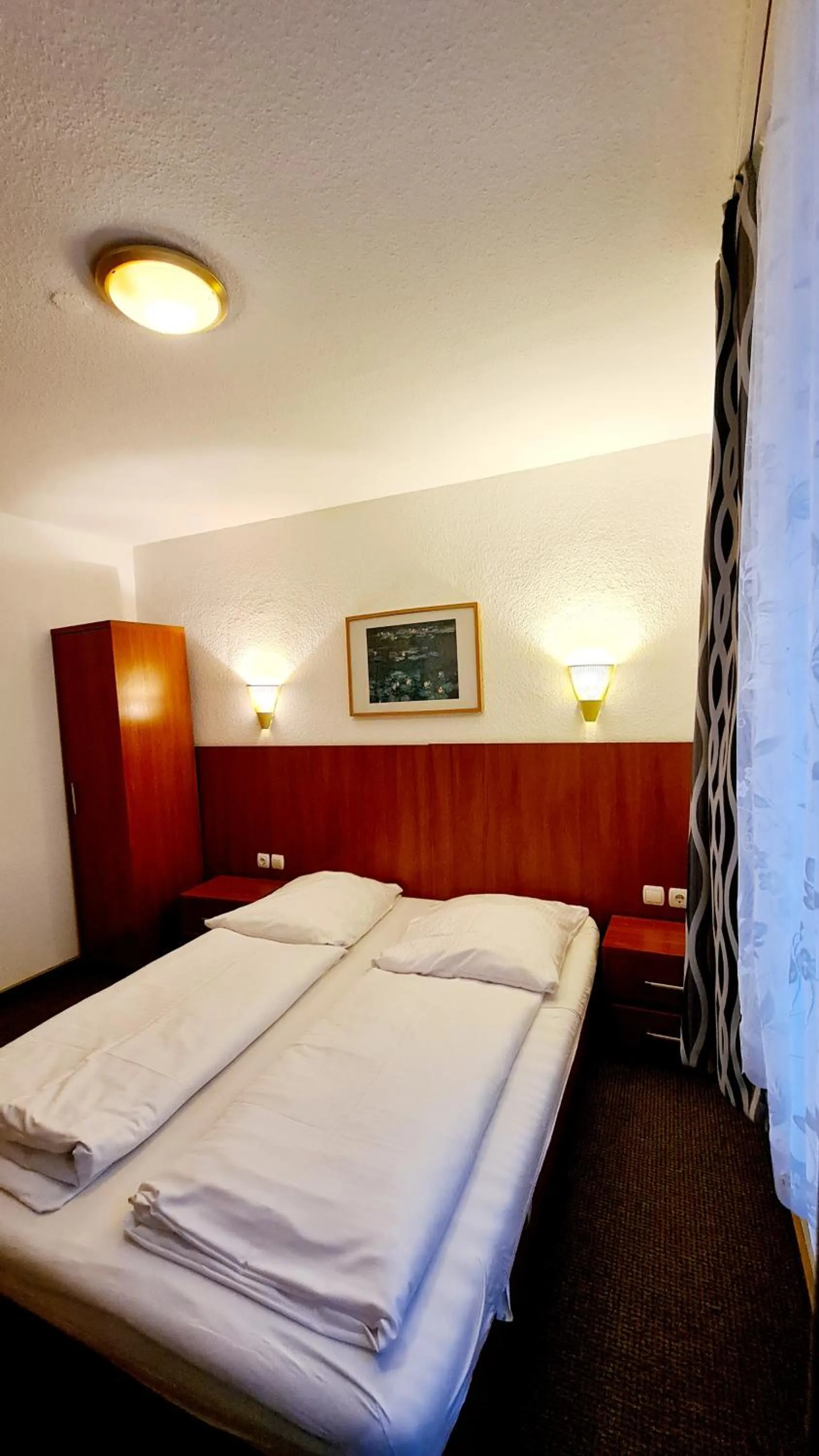 Bed in Hotel Zentrum