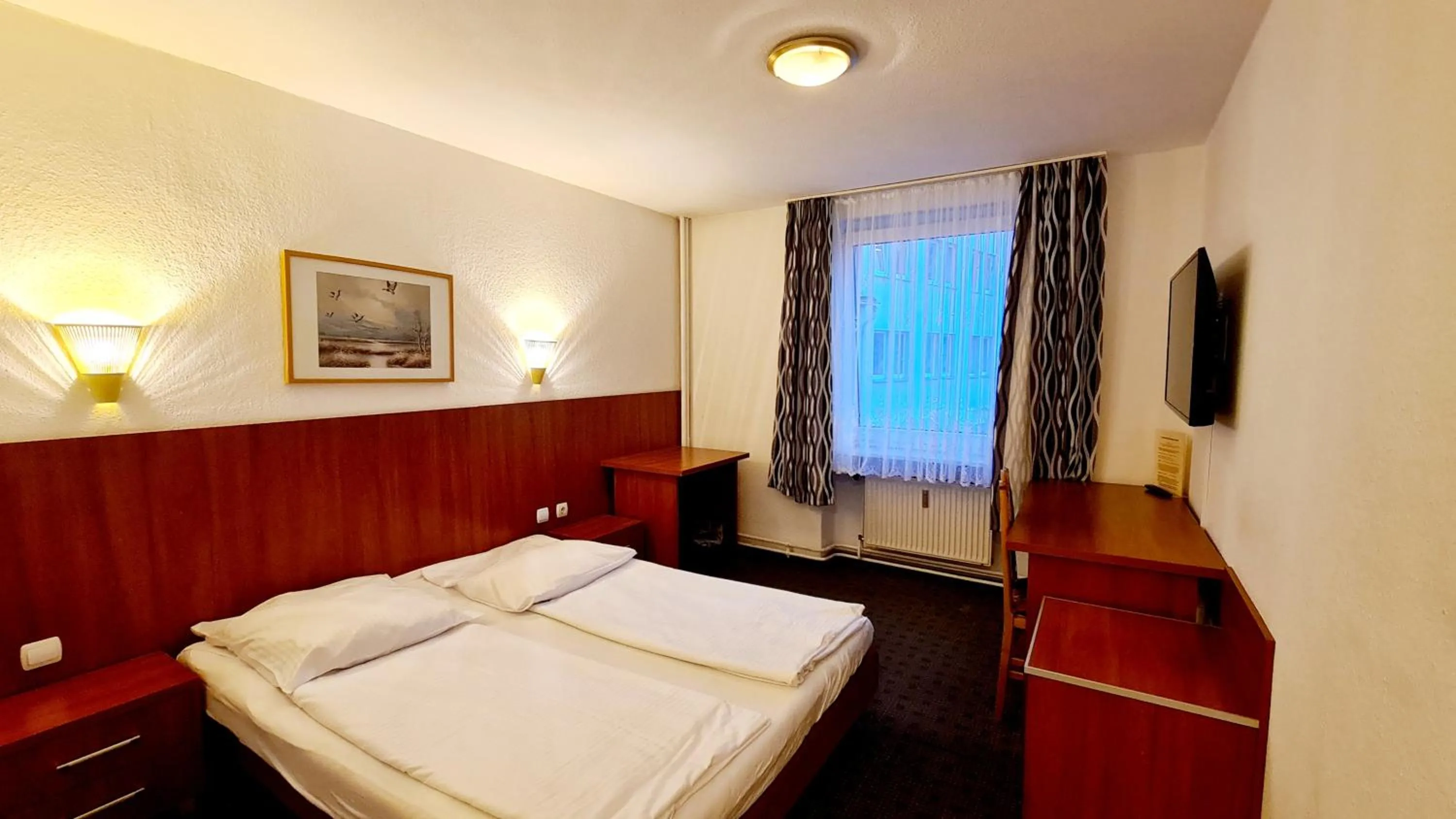 Bed in Hotel Zentrum