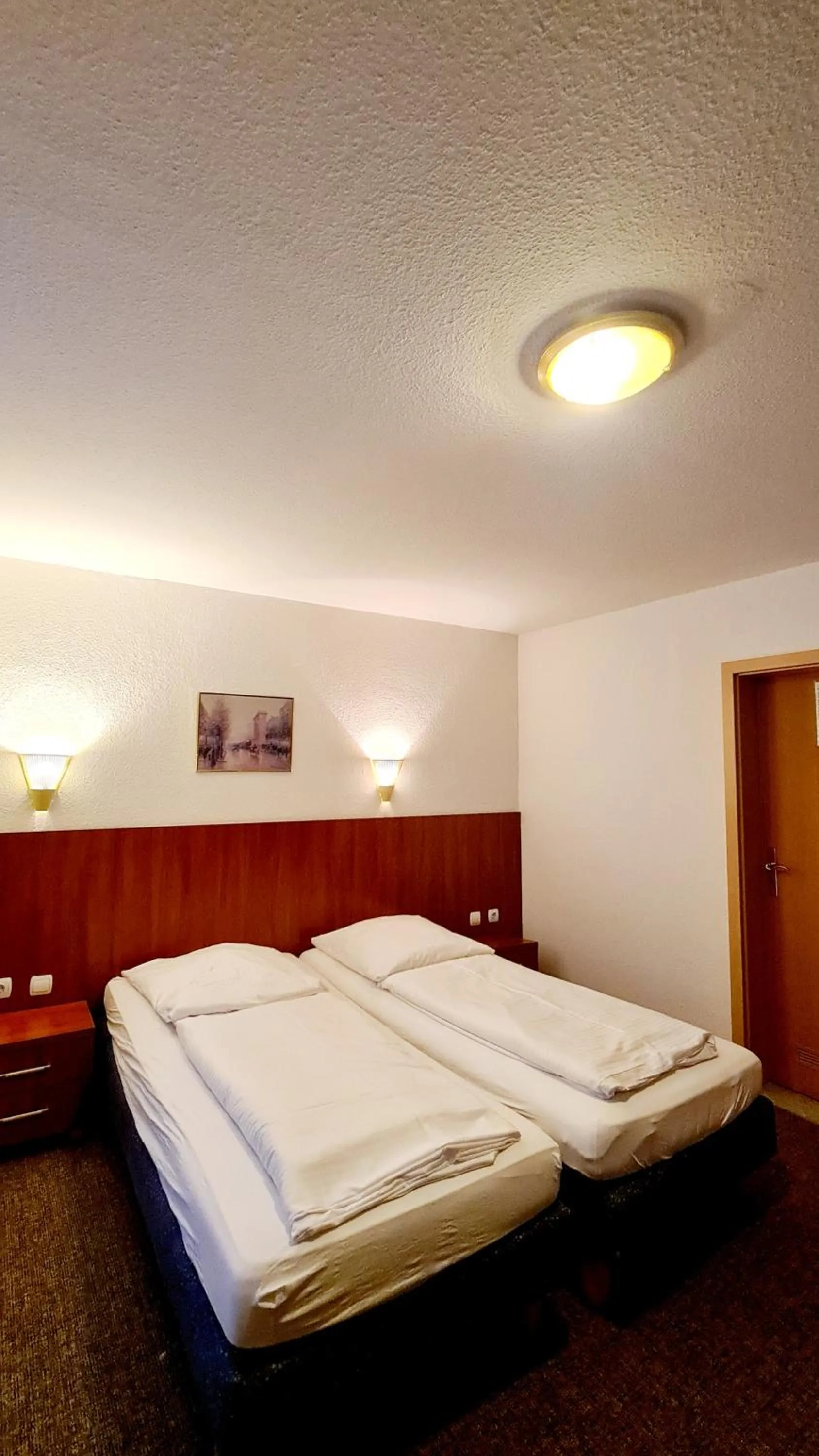 Bed in Hotel Zentrum