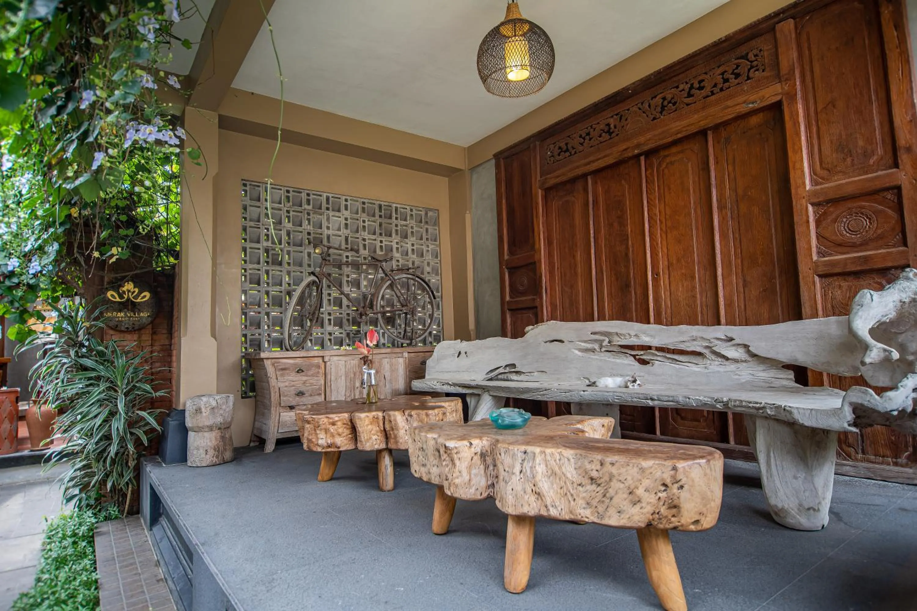 Seating area in Merak Village by Prasi