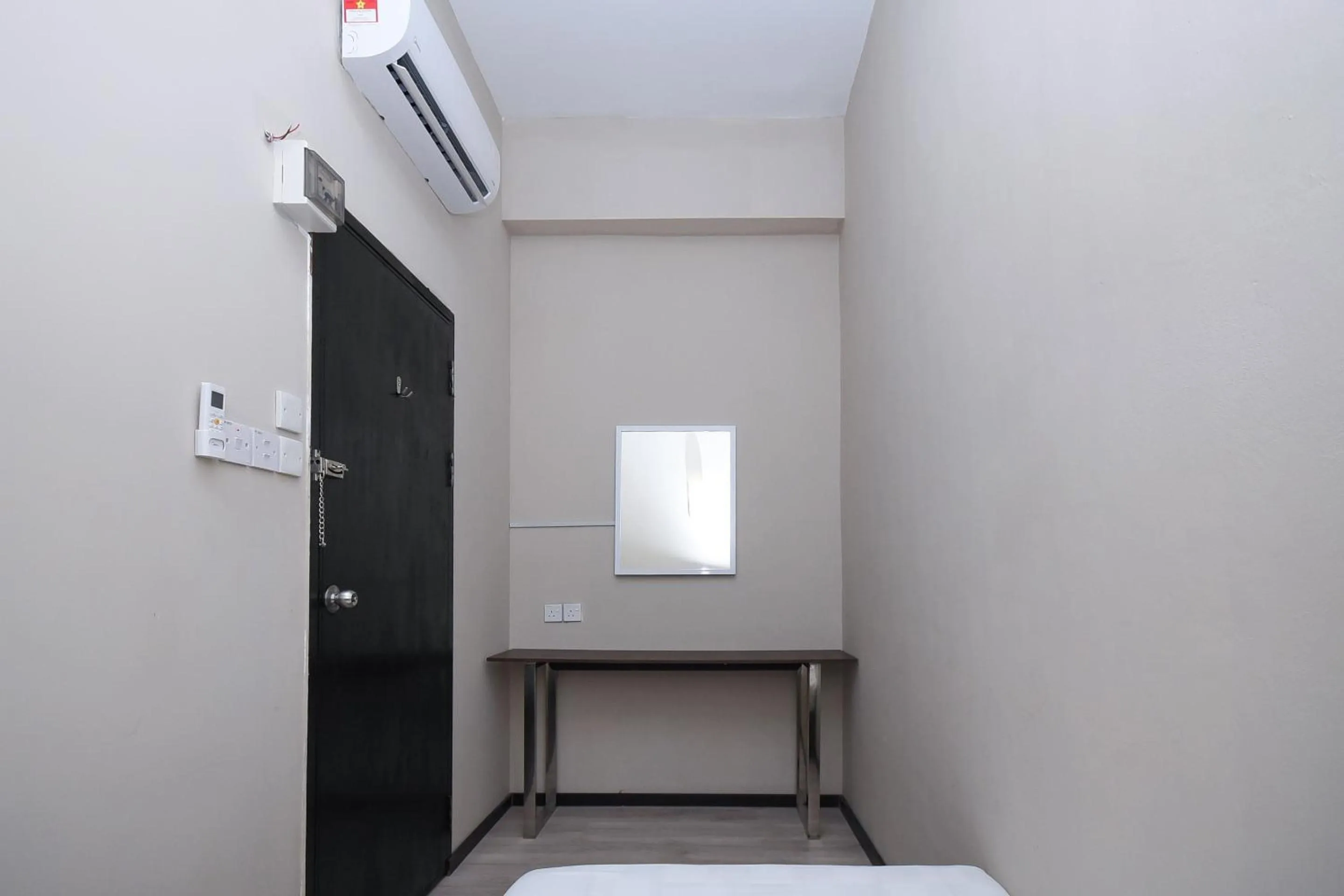 Bedroom in Hotel O Lm Residence