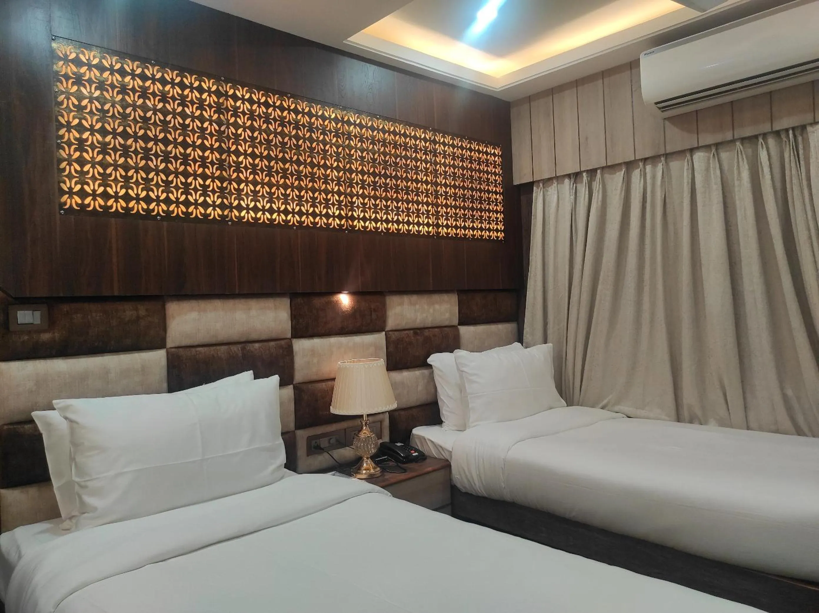 Bed in Hotel Aavas Inn