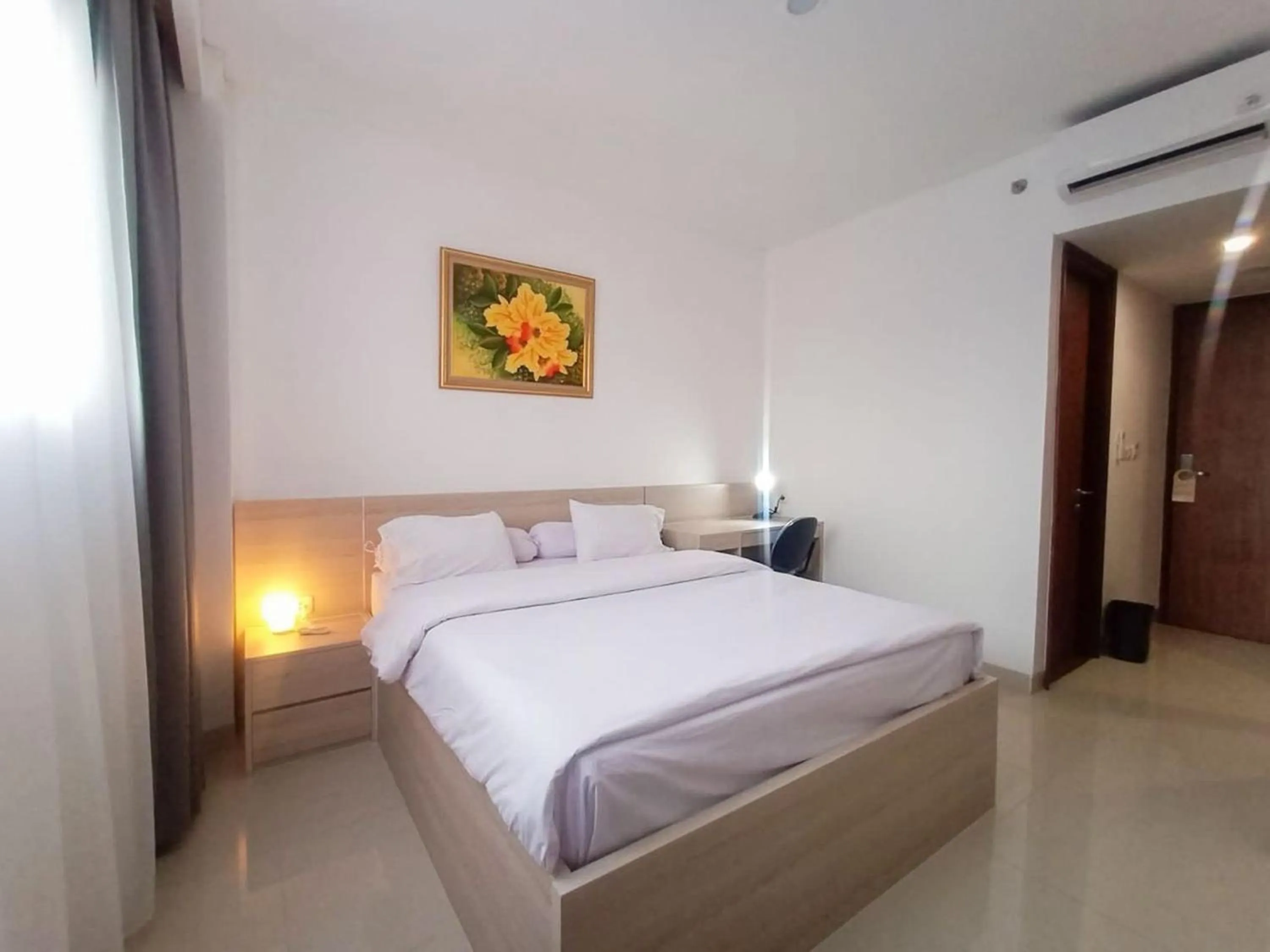 Bed in Mendjangan Mansion