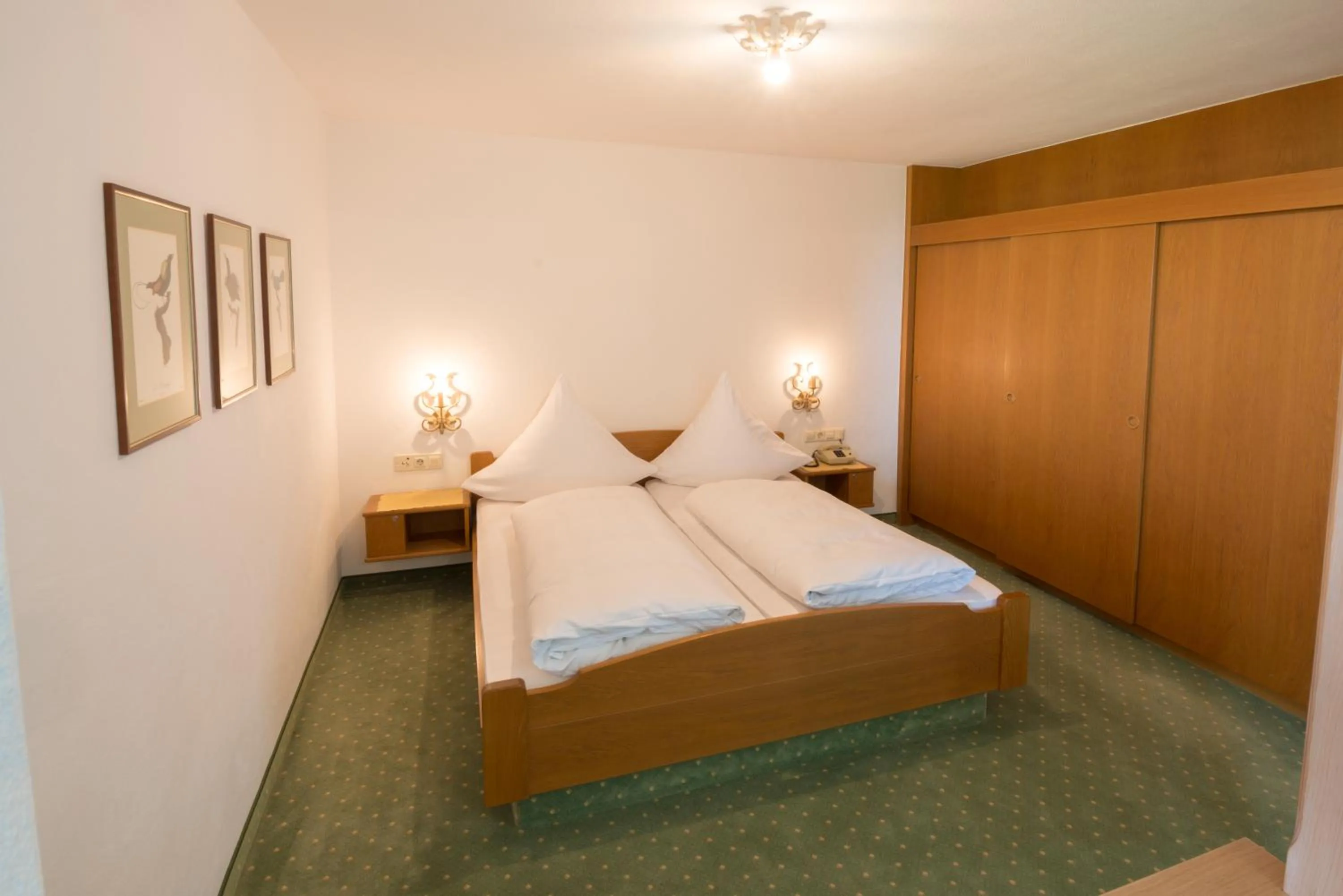 Bed in Hotel St. Ulrich Garni