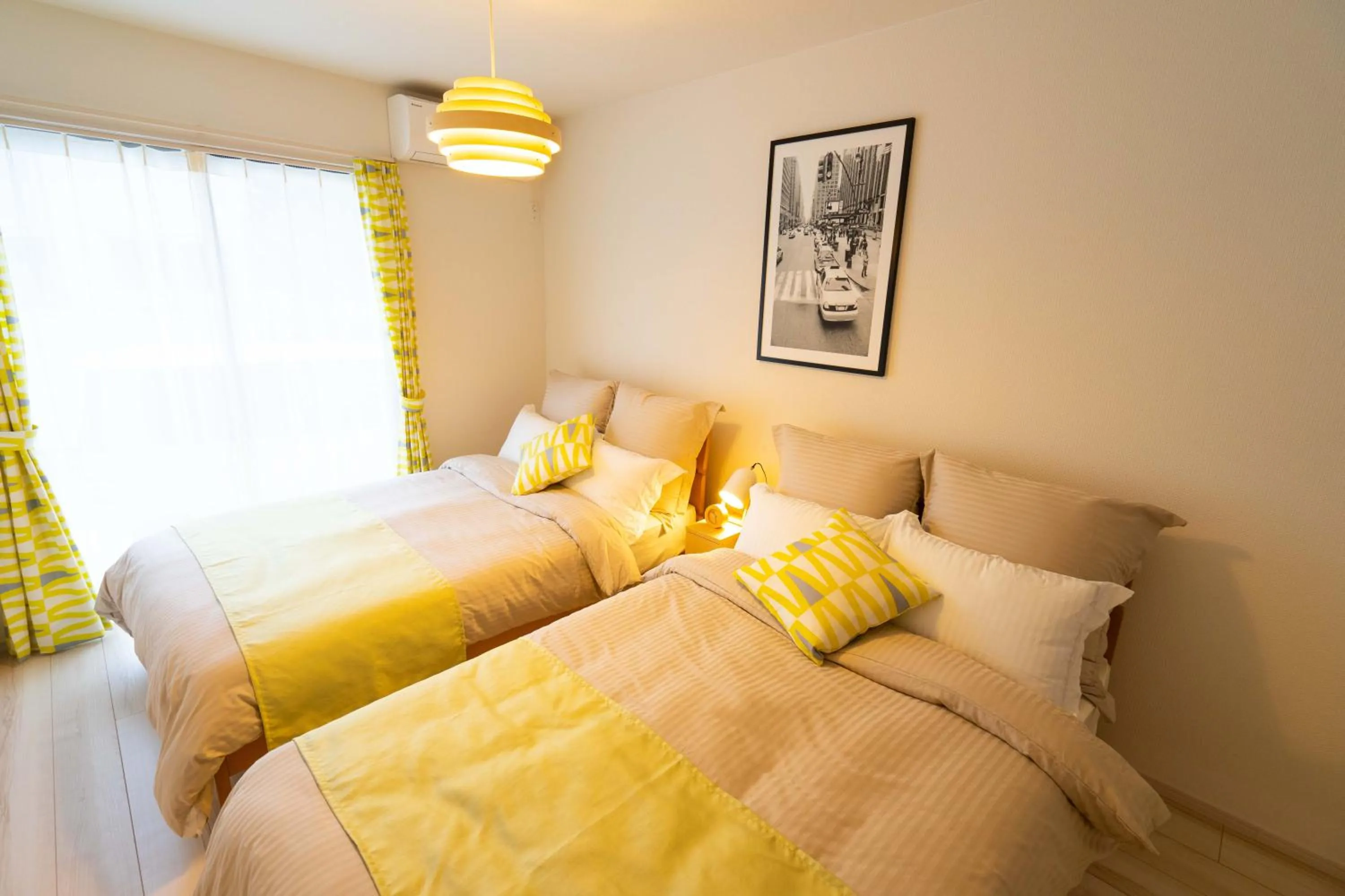 Photo of the whole room, Bed in OKINAWA BEACH HOUSE Golden Drop S