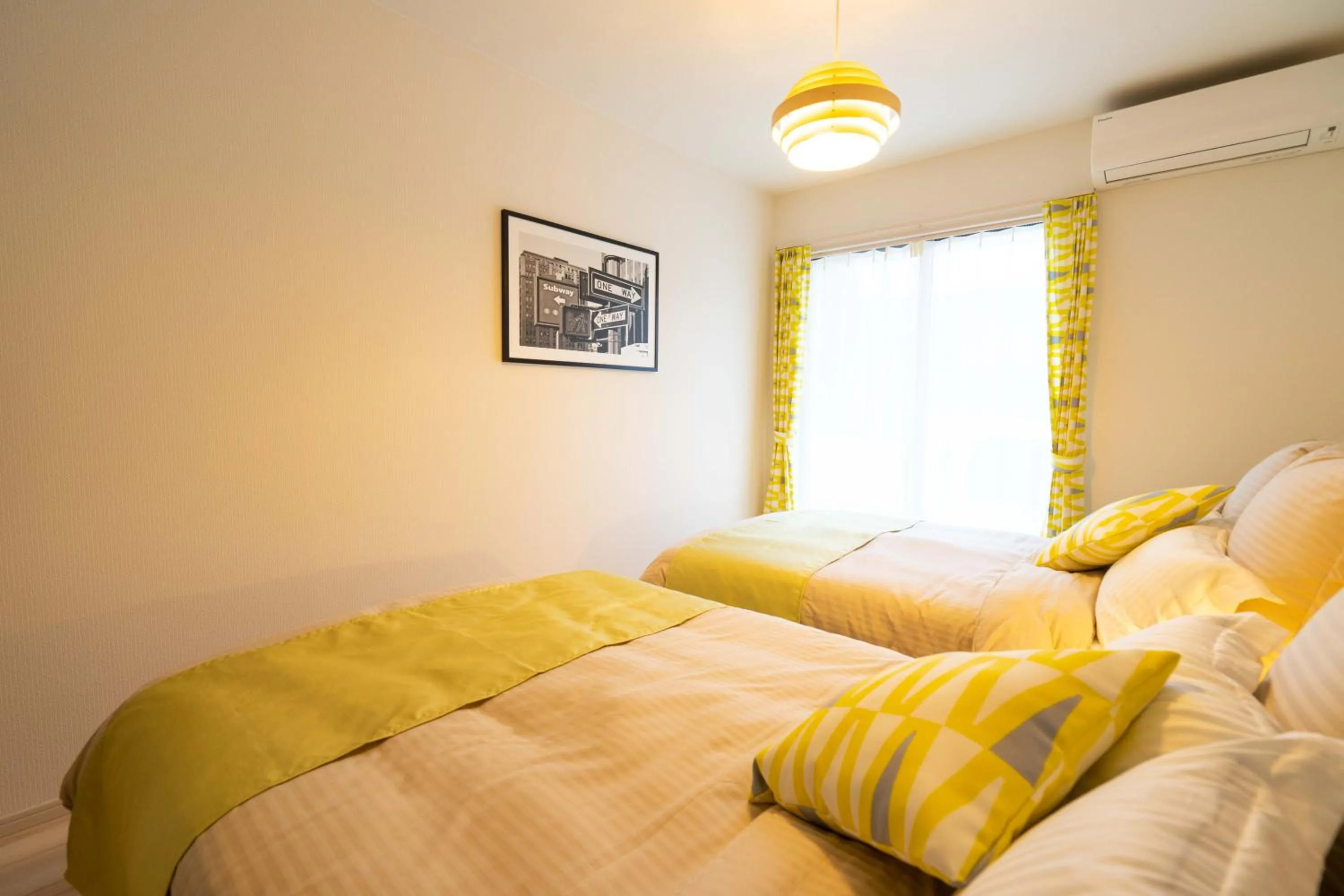 Photo of the whole room, Bed in OKINAWA BEACH HOUSE Golden Drop S