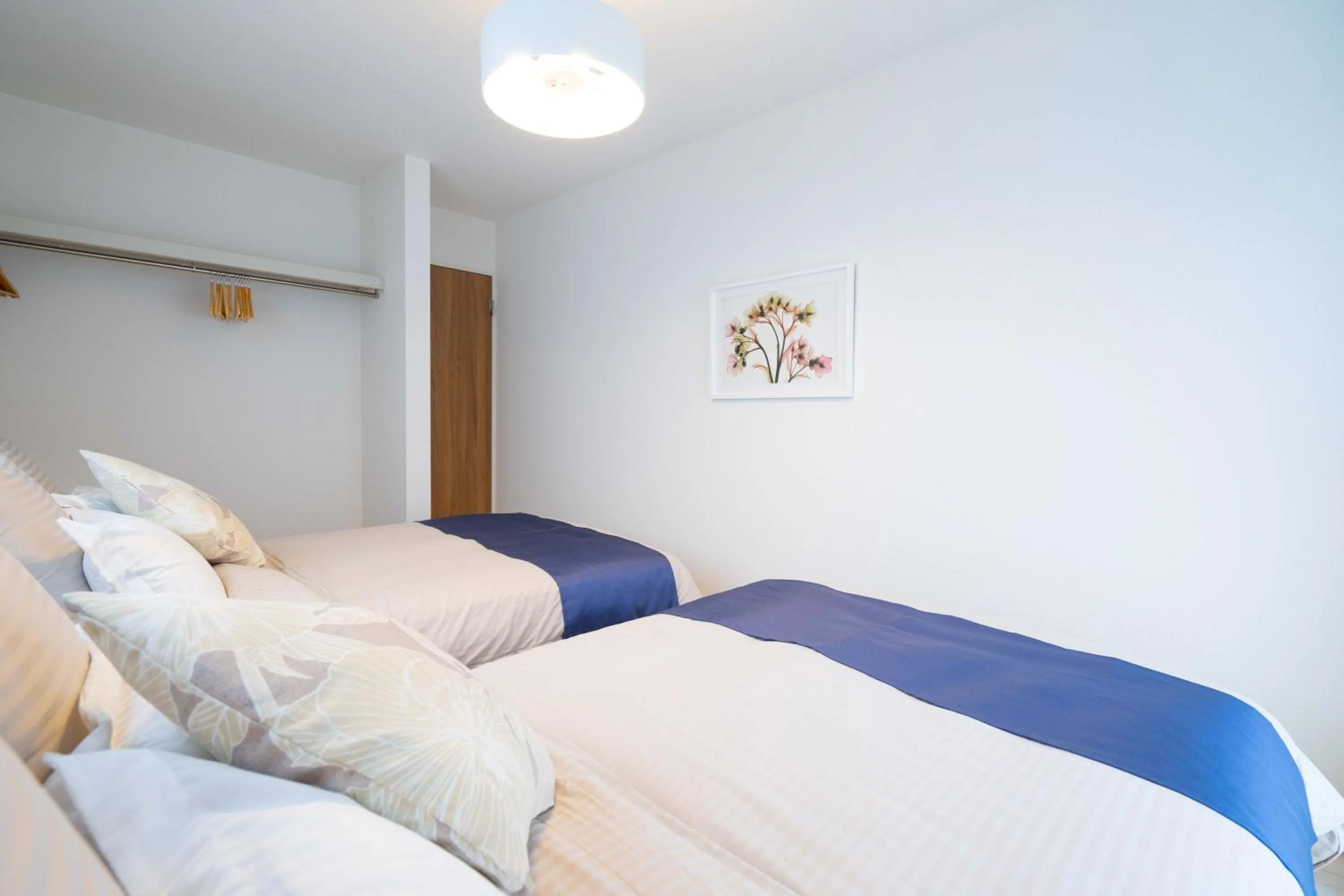 Photo of the whole room, Bed in OKINAWA BEACH HOUSE Golden Drop S