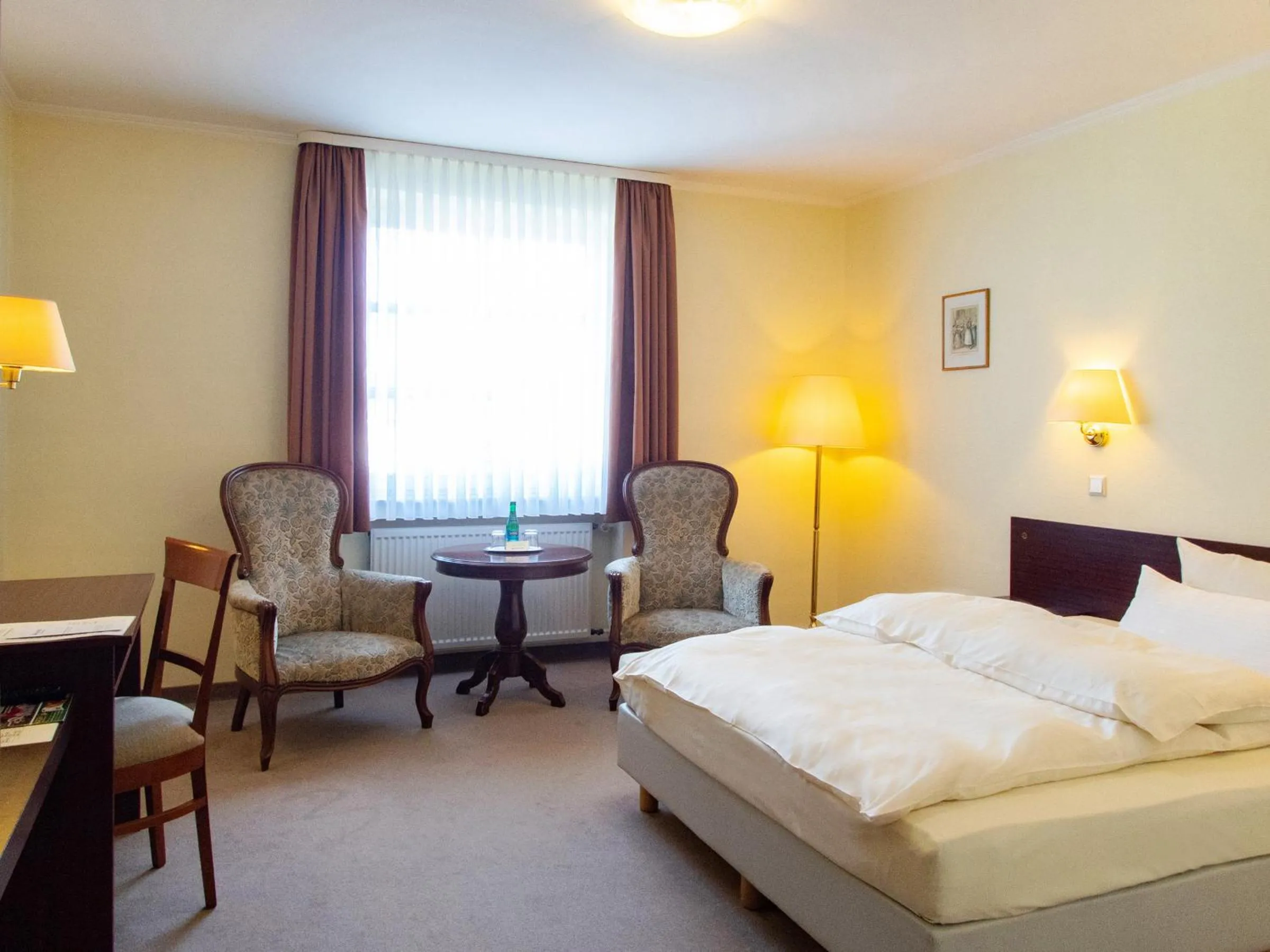 Photo of the whole room, Bed in Hotel Bürgerhof Wetzlar