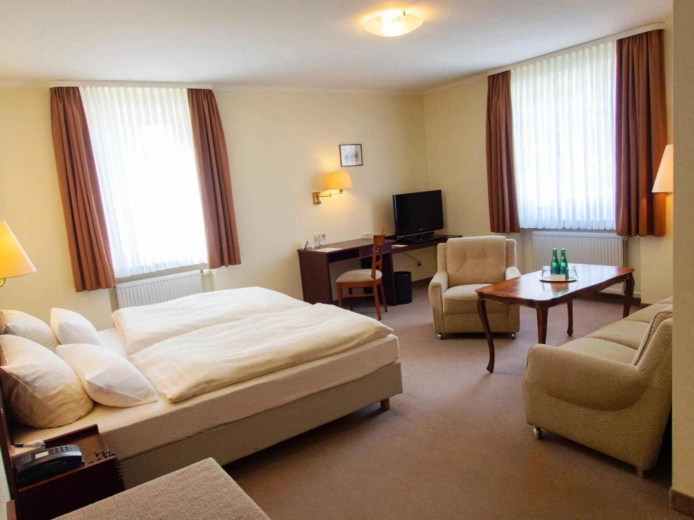 Photo of the whole room, Bed in Hotel Bürgerhof Wetzlar