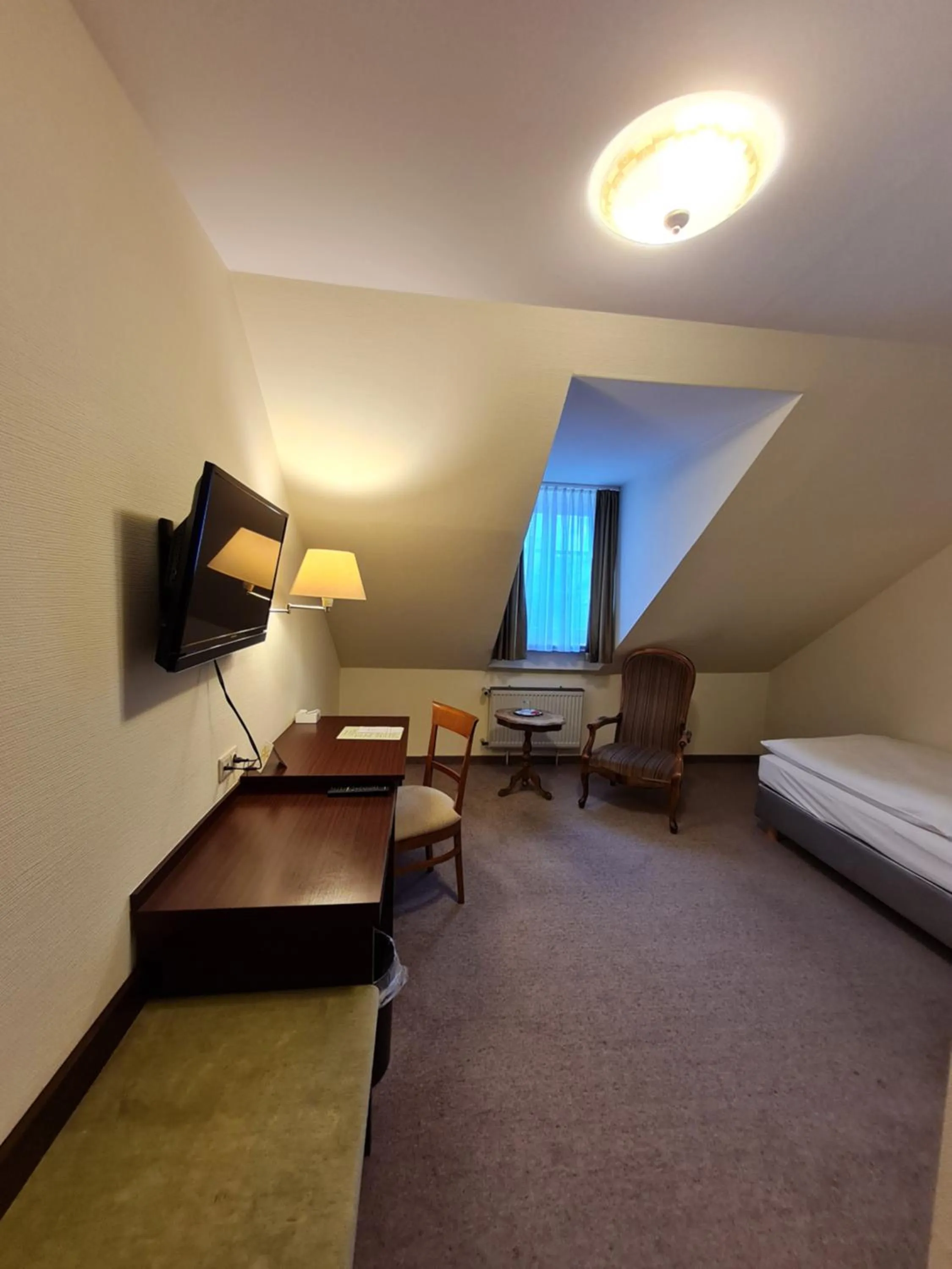 Photo of the whole room, Bed in Hotel Bürgerhof Wetzlar