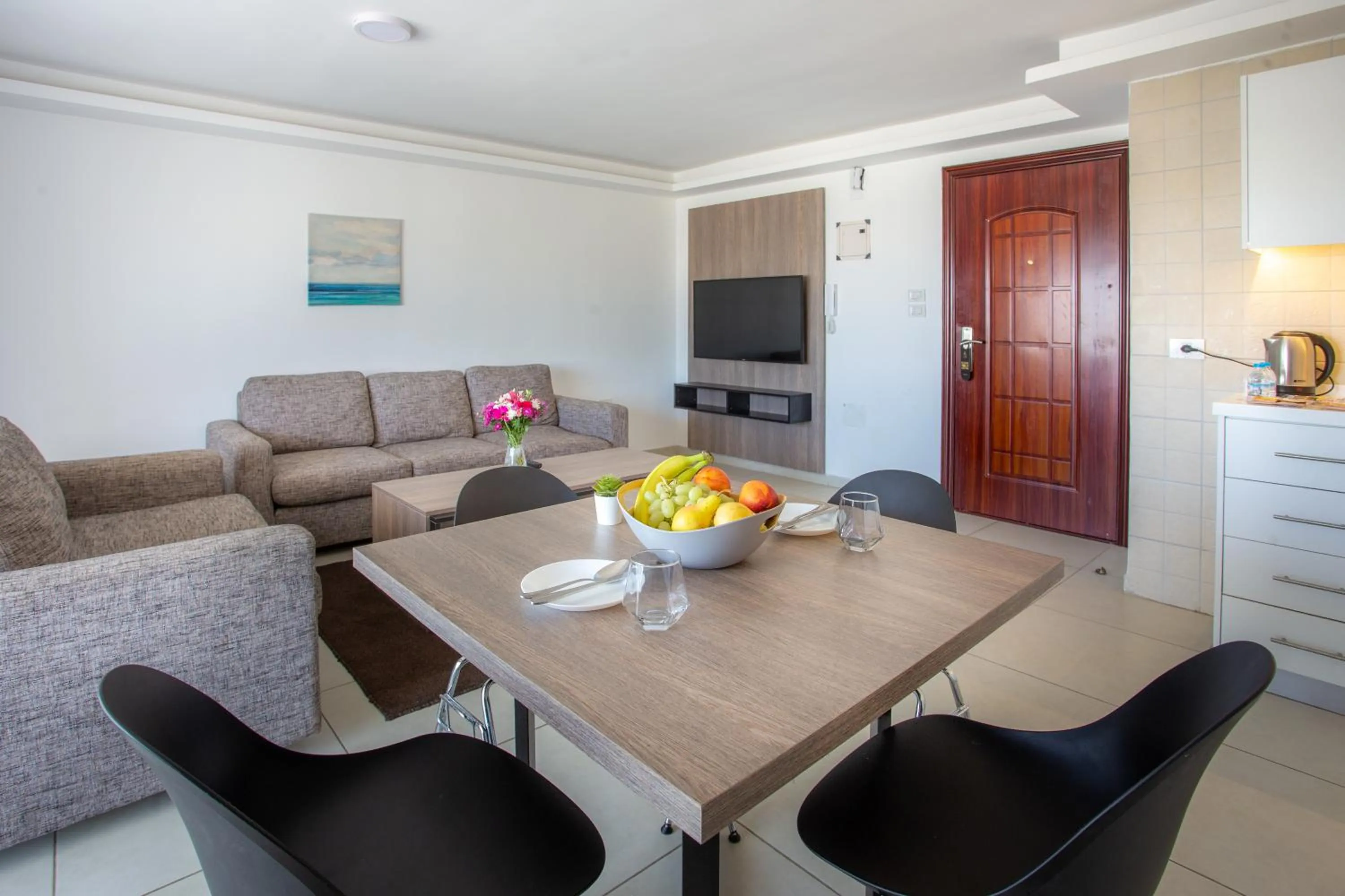 Living room in Triple A Hotel Suites