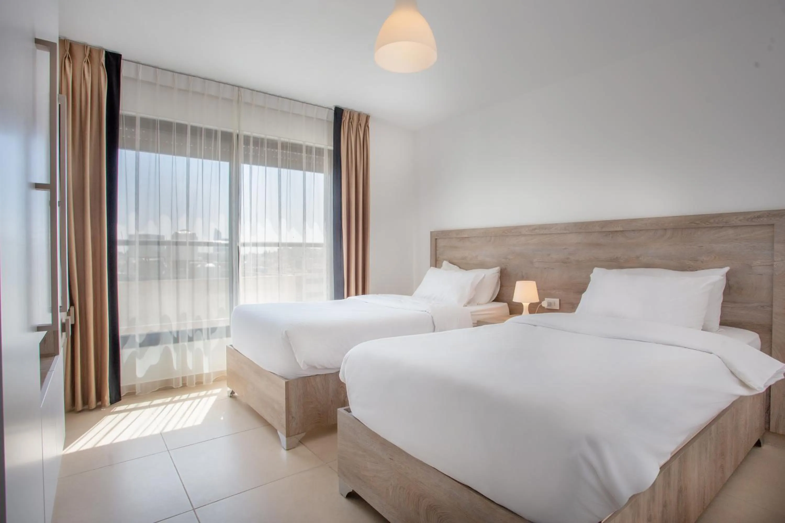 Bedroom, Bed in Triple A Hotel Suites