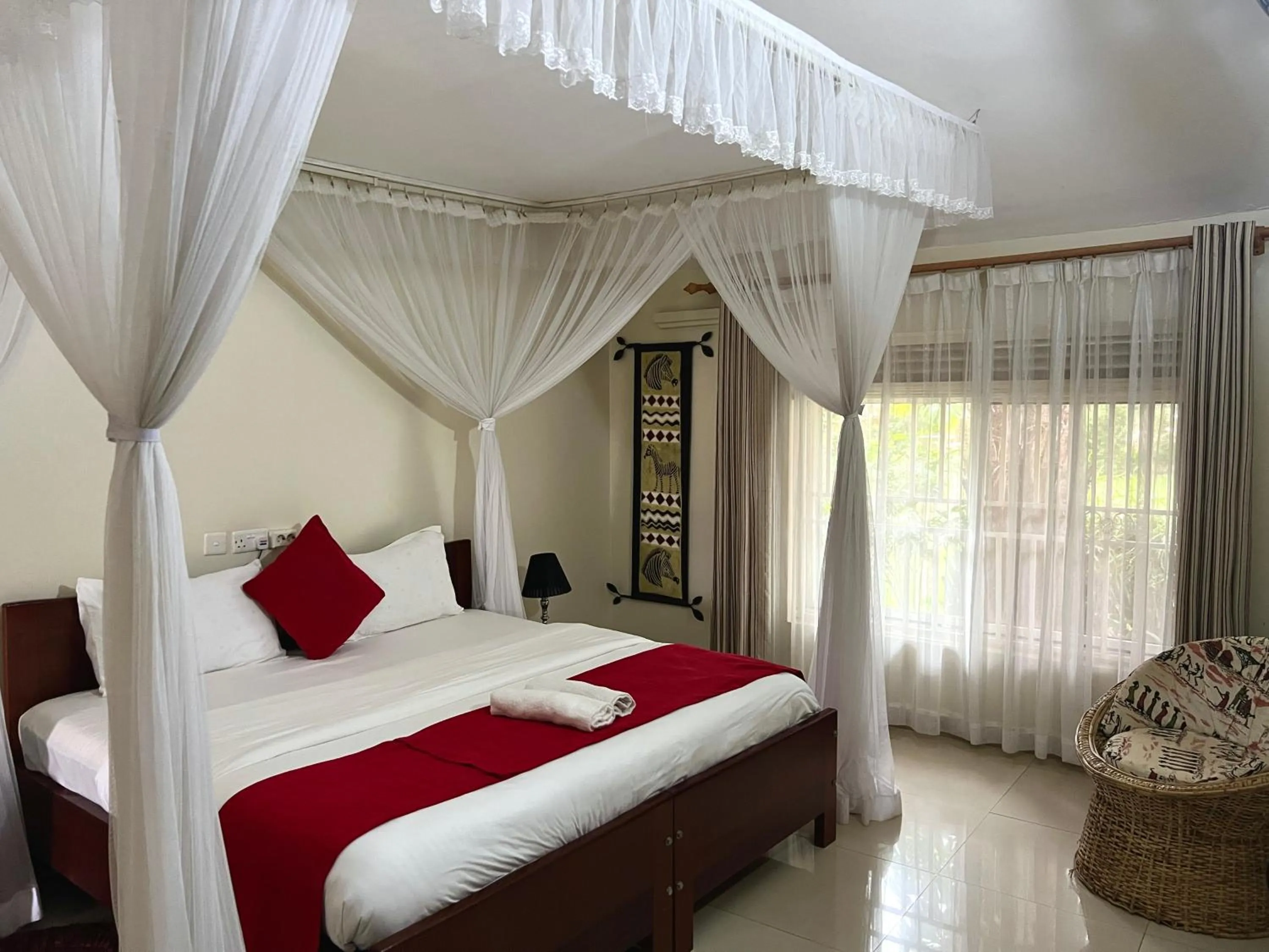 Bed in Sunset Hotel Entebbe