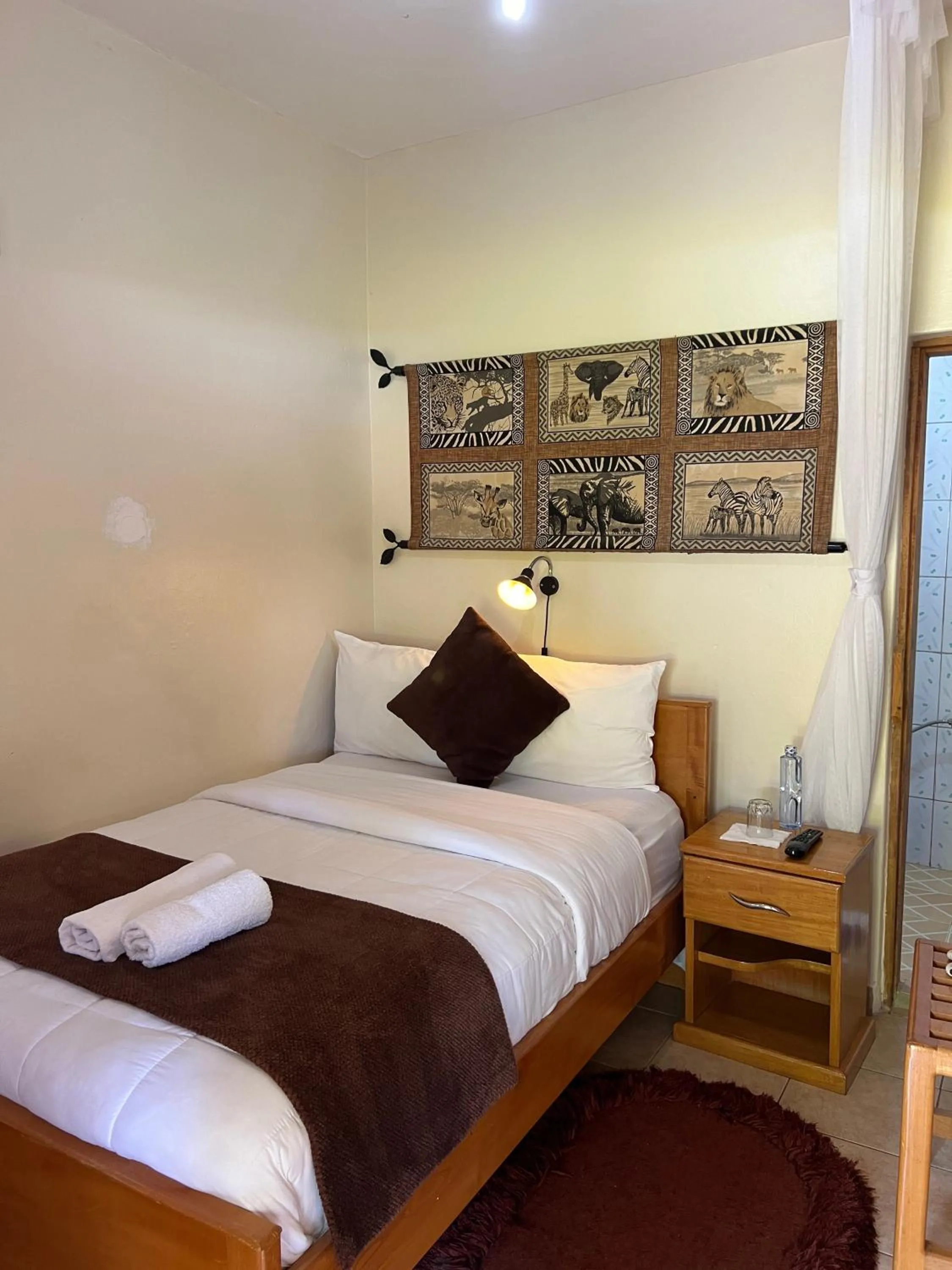 Photo of the whole room, Bed in Sunset Hotel Entebbe