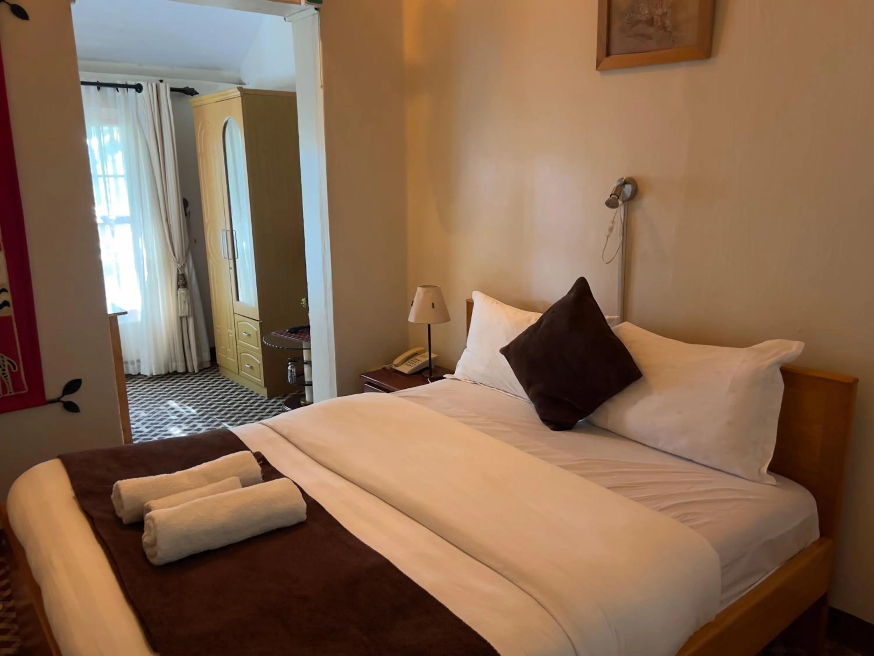 Bed in Sunset Hotel Entebbe