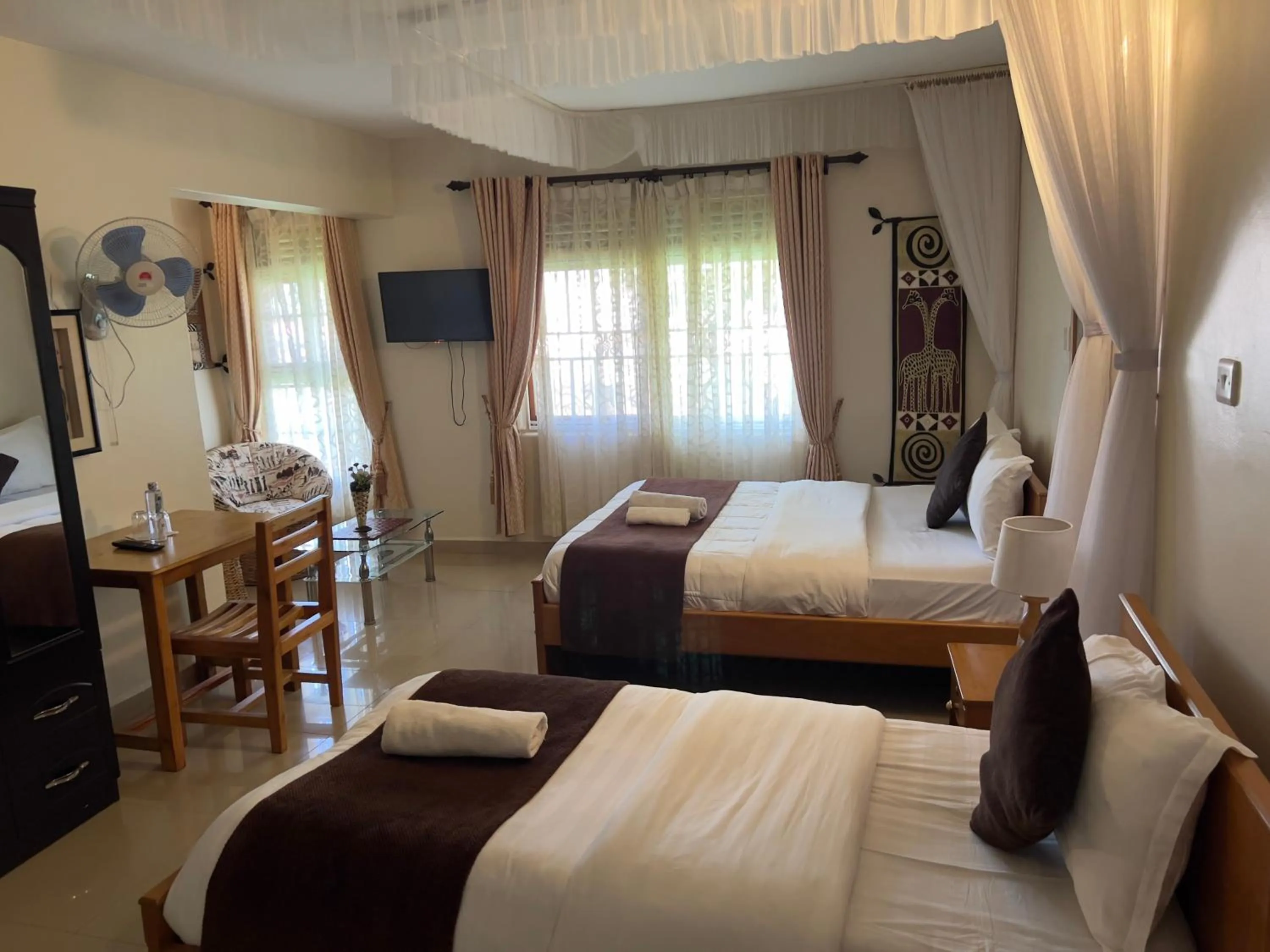 Bedroom, Bed in Sunset Hotel Entebbe