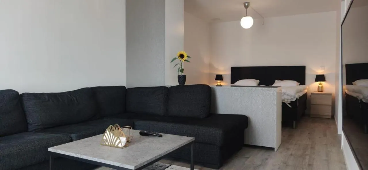 Living room, Bed in Lägenhetshotell Varvet