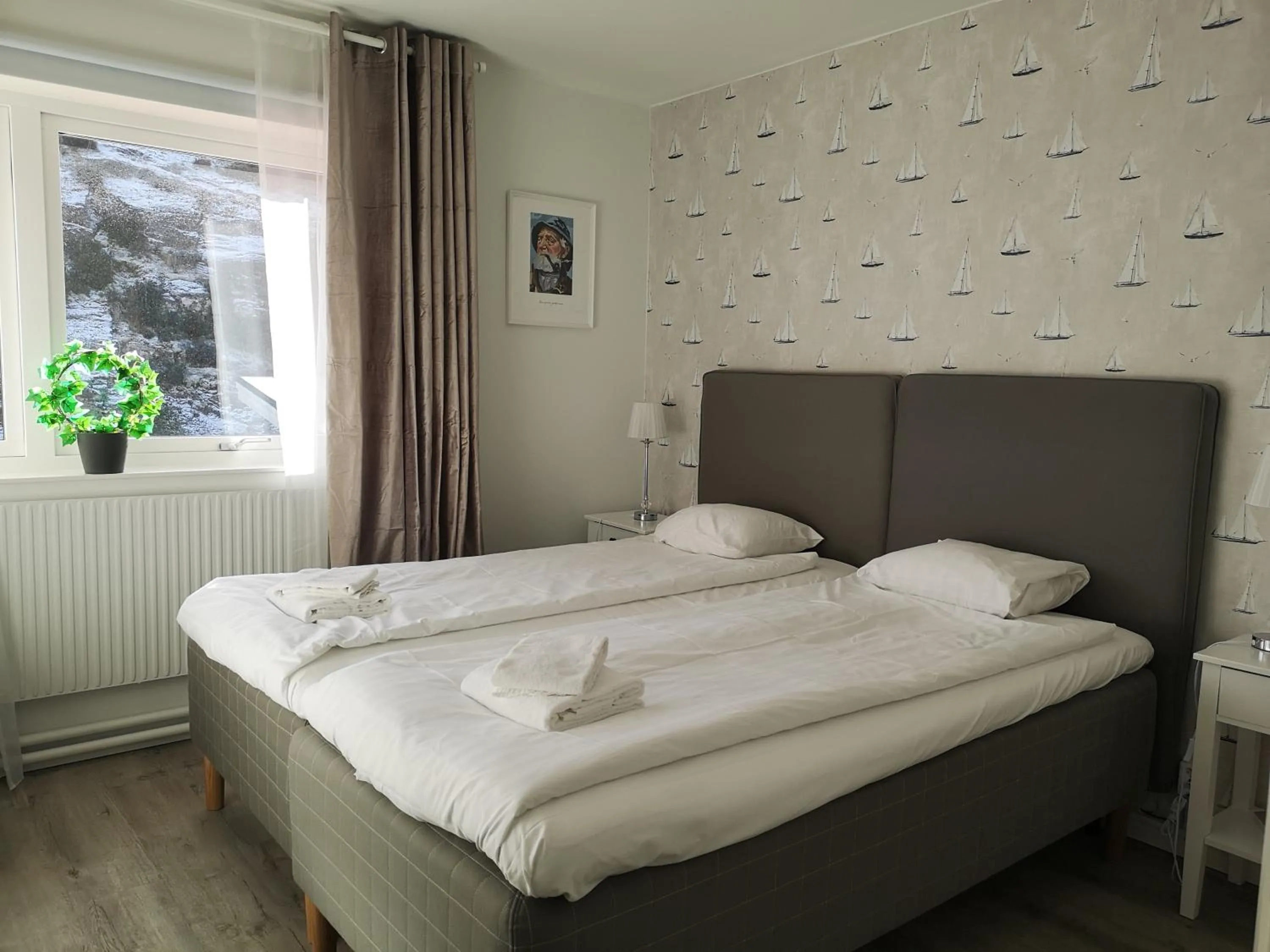 Bed in Lägenhetshotell Varvet