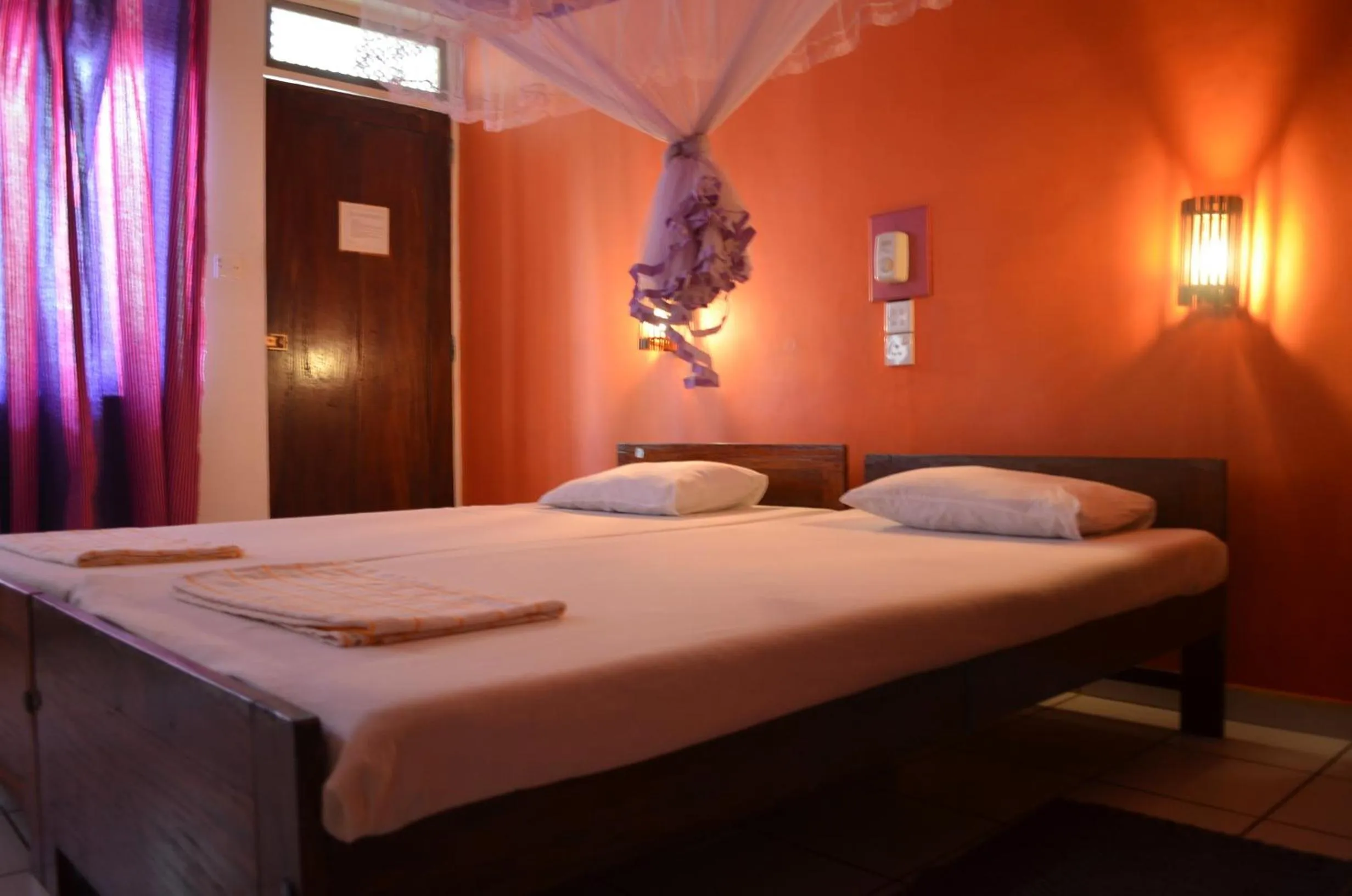 Bed in Hotel Paradiso