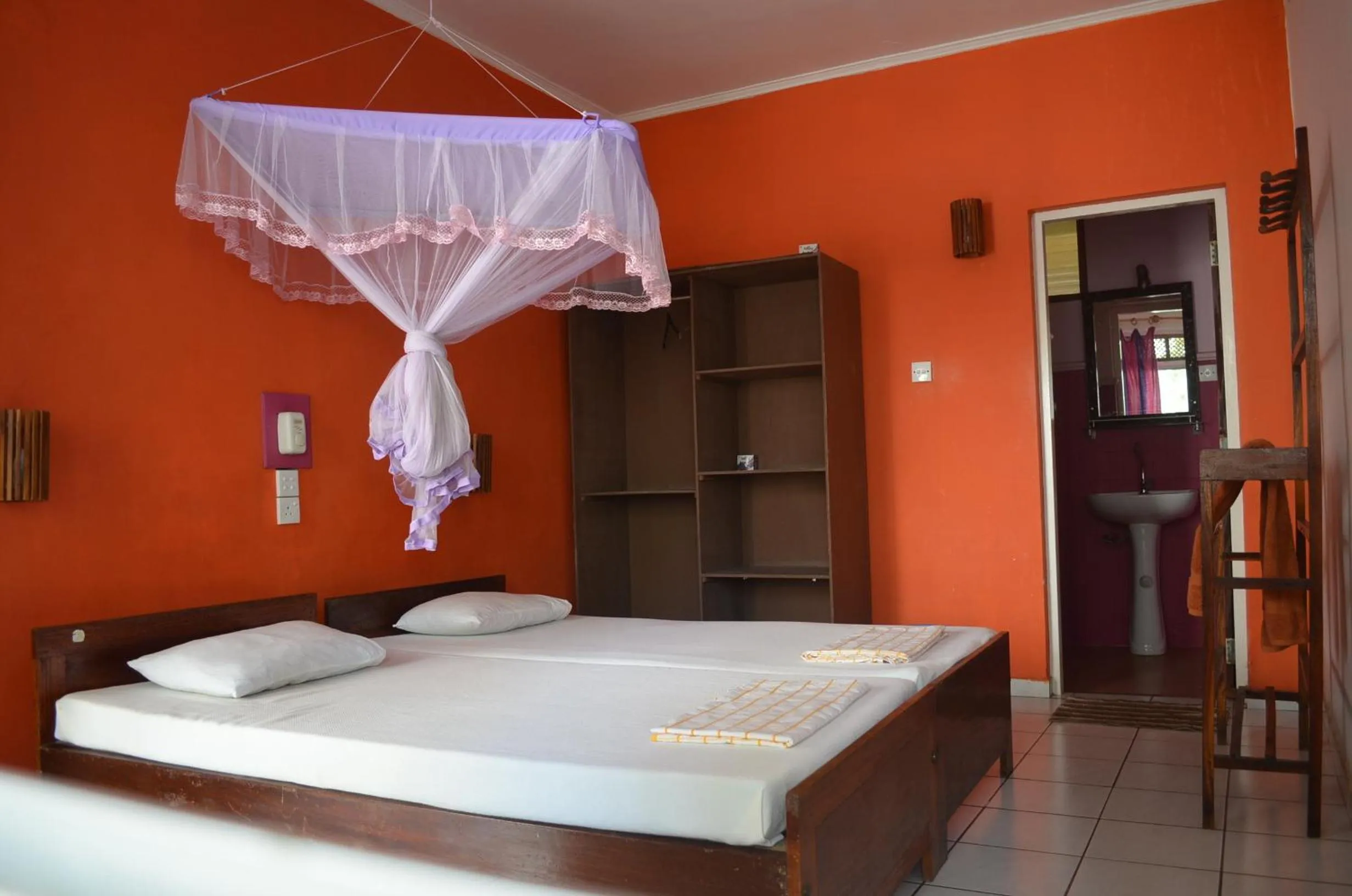 Bed in Hotel Paradiso