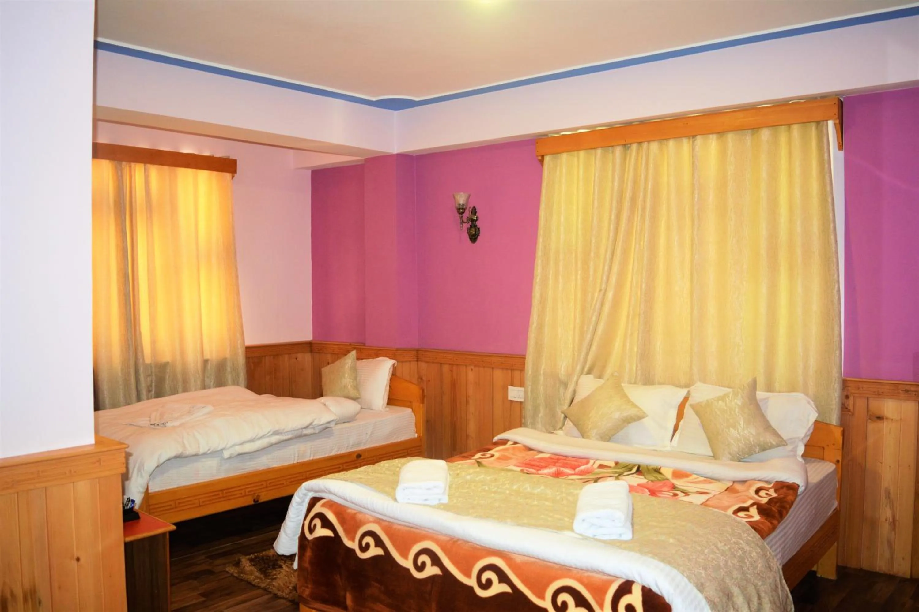 Bedroom in Rufina Lachung de'CROWN