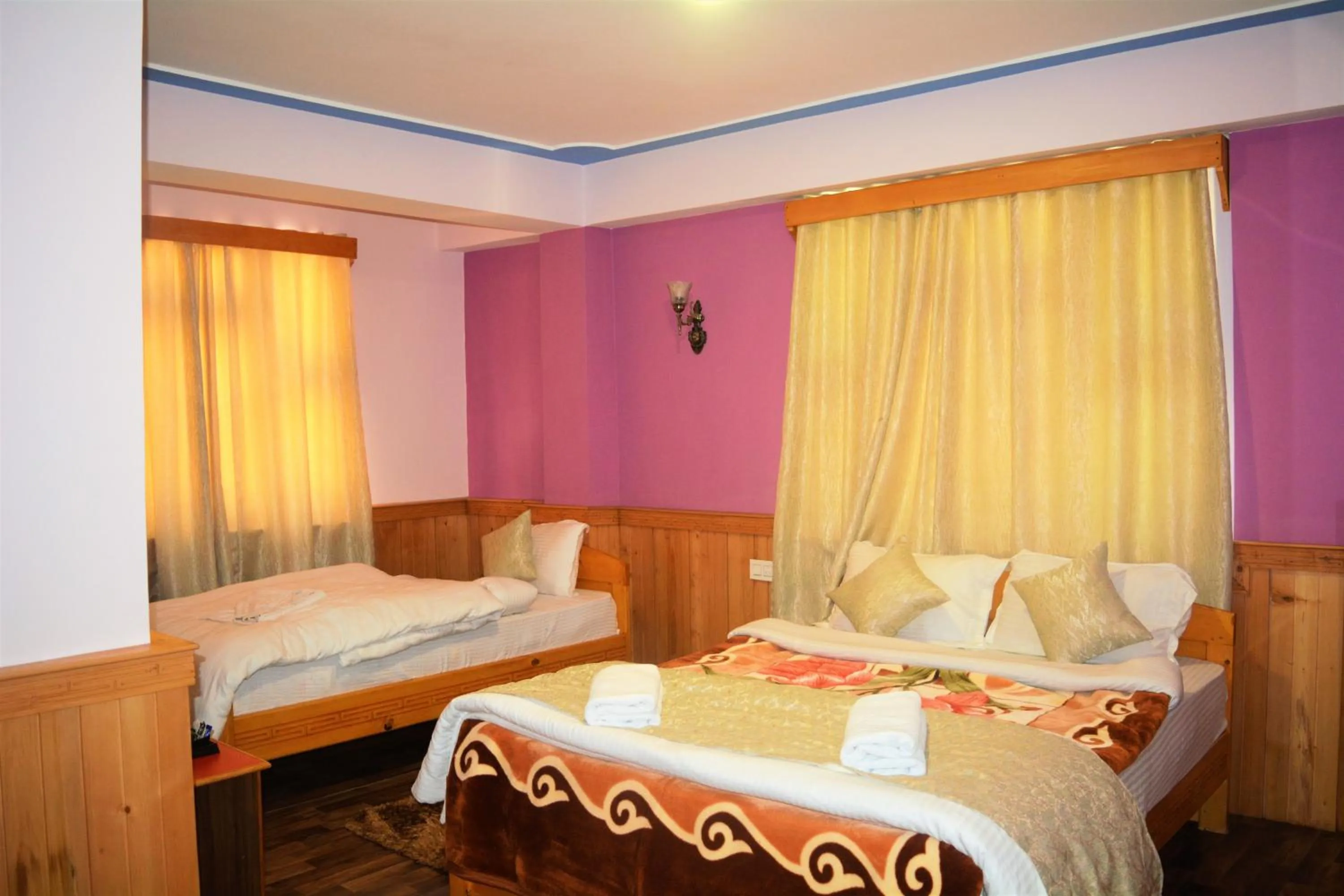 Bedroom in Rufina Lachung de'CROWN