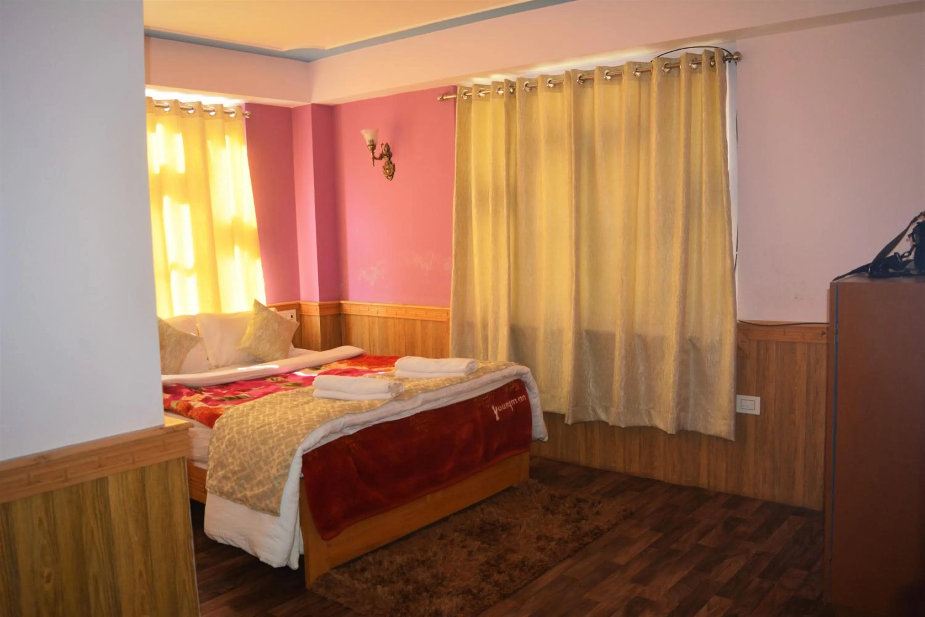 Bedroom in Rufina Lachung de'CROWN