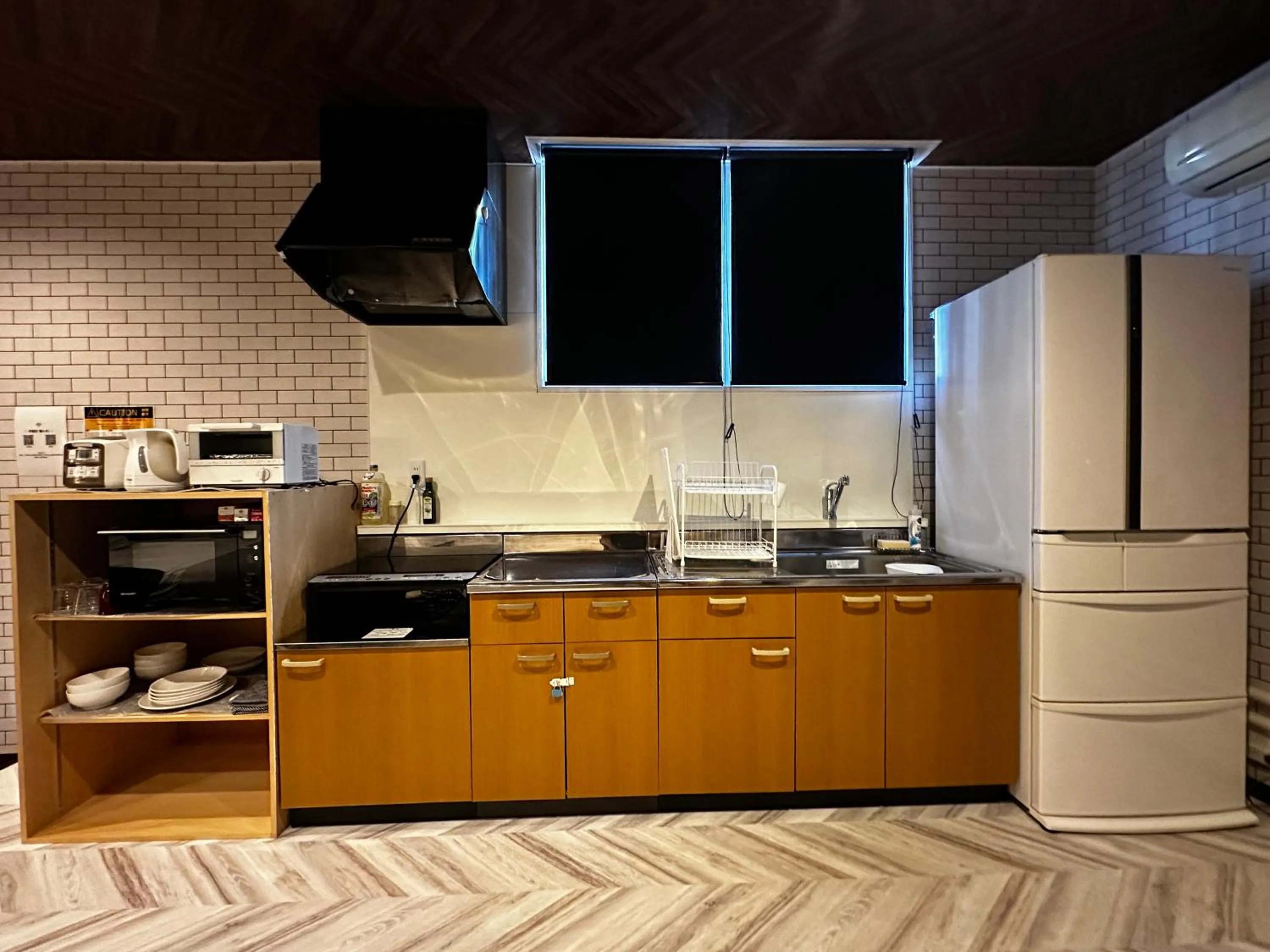 kitchen in Economy Hotel Upashi