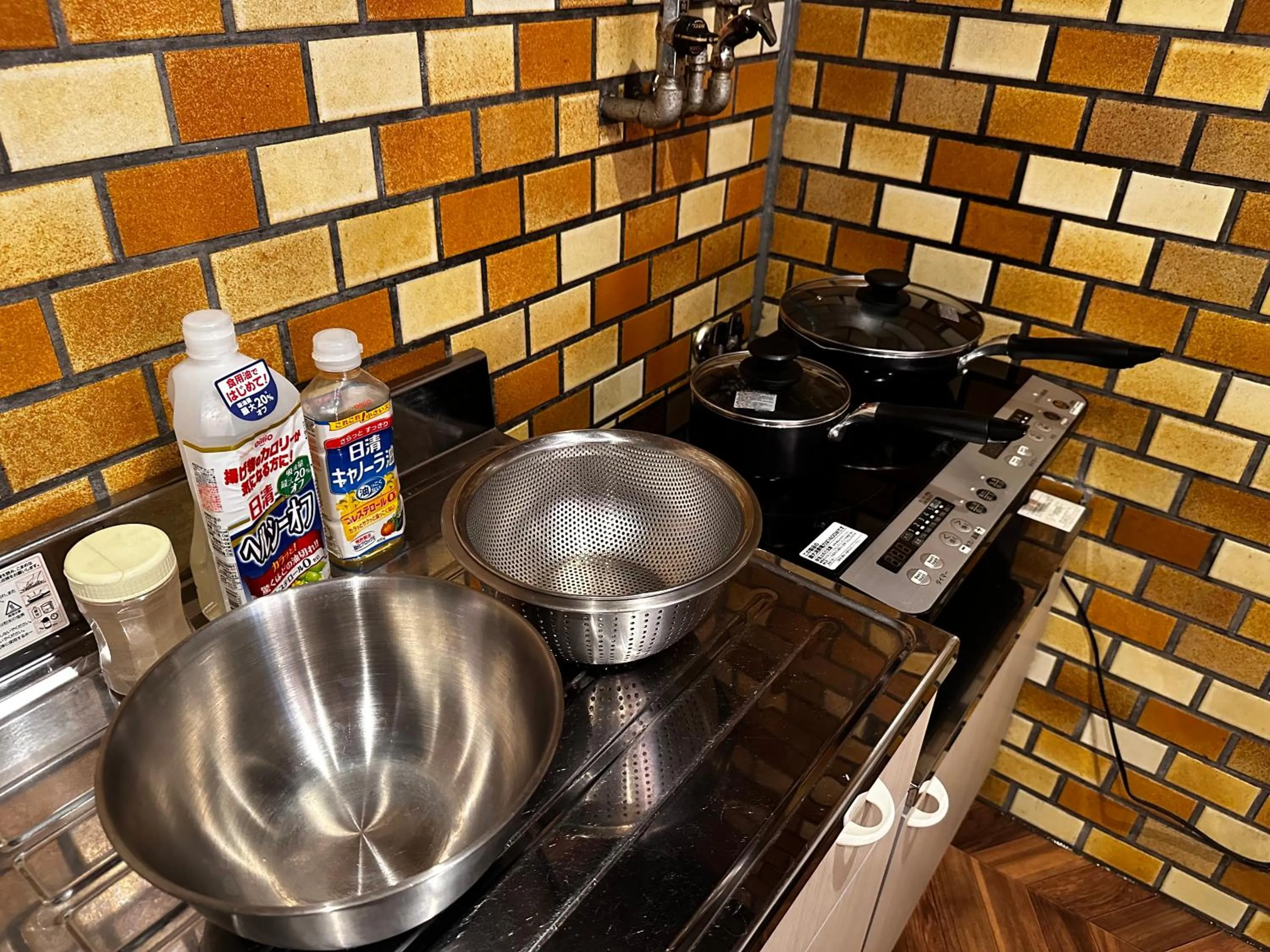 kitchen in Economy Hotel Upashi