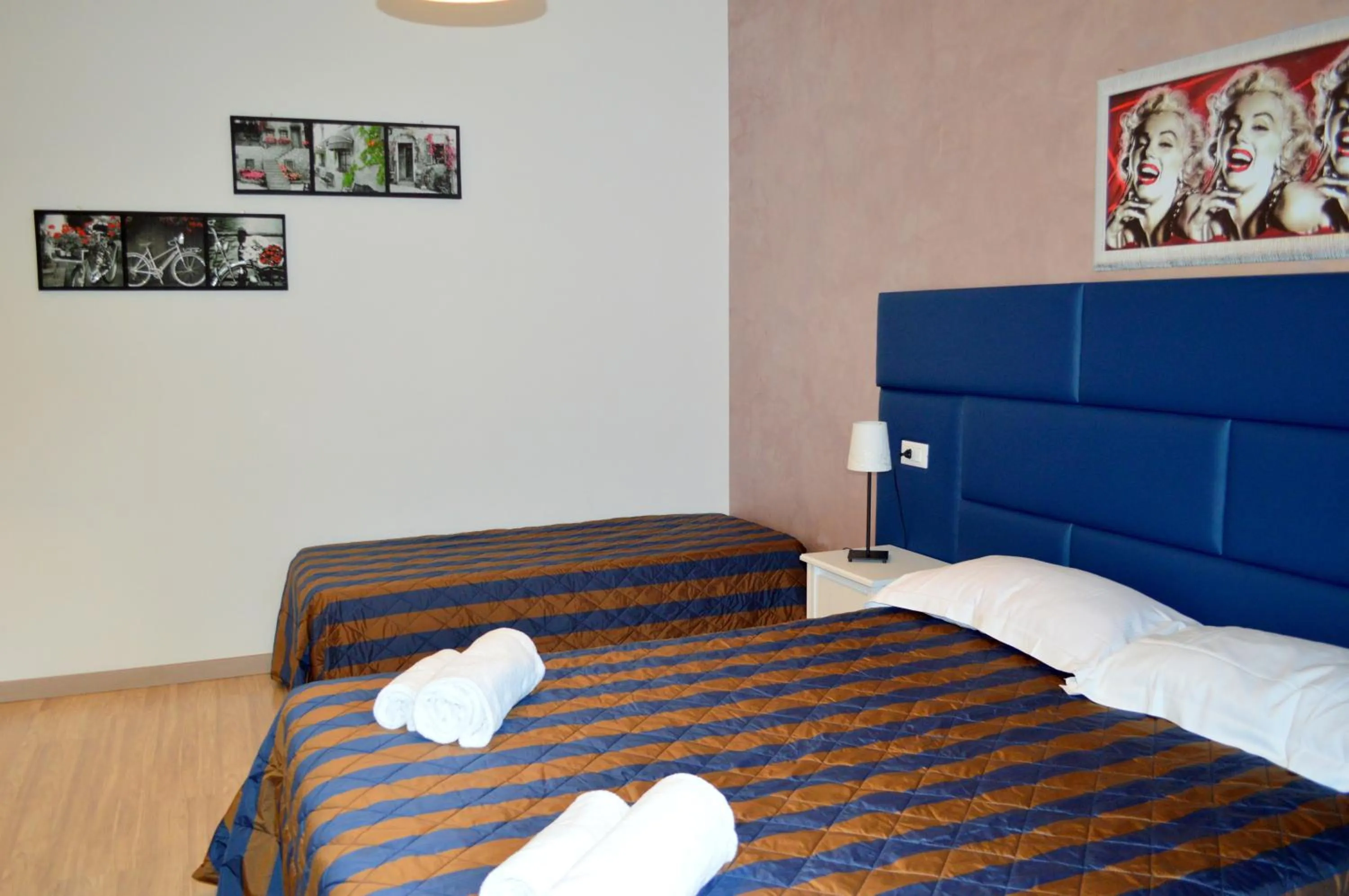 Bed in Check-Inn Rooms