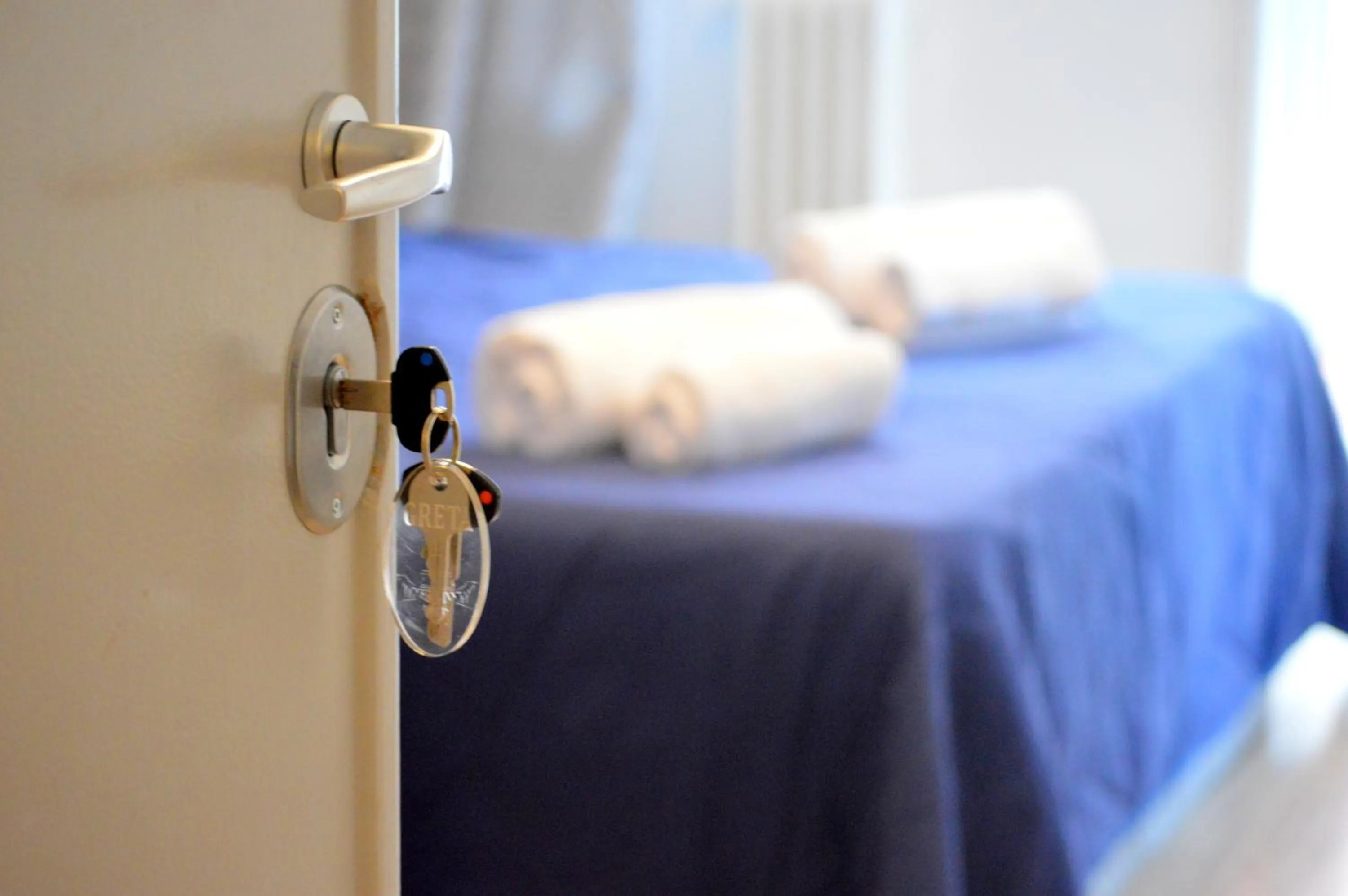 Photo of the whole room, Bed in Check-Inn Rooms